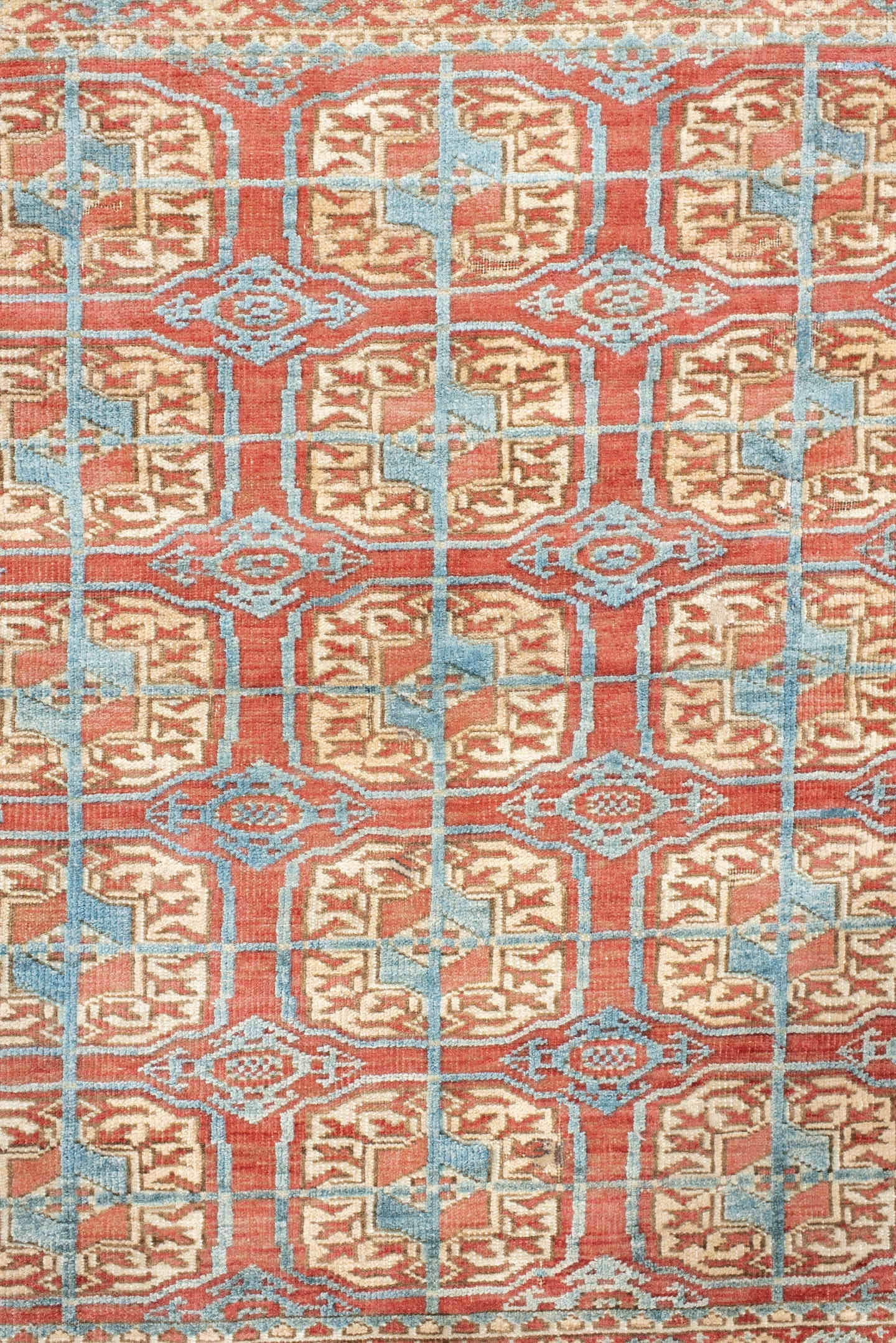 3' x 4' one-of-a-kind handmade antique Bokara small size rug. Color palette: coral, ivory, sky_blue, rust, camel, terracotta