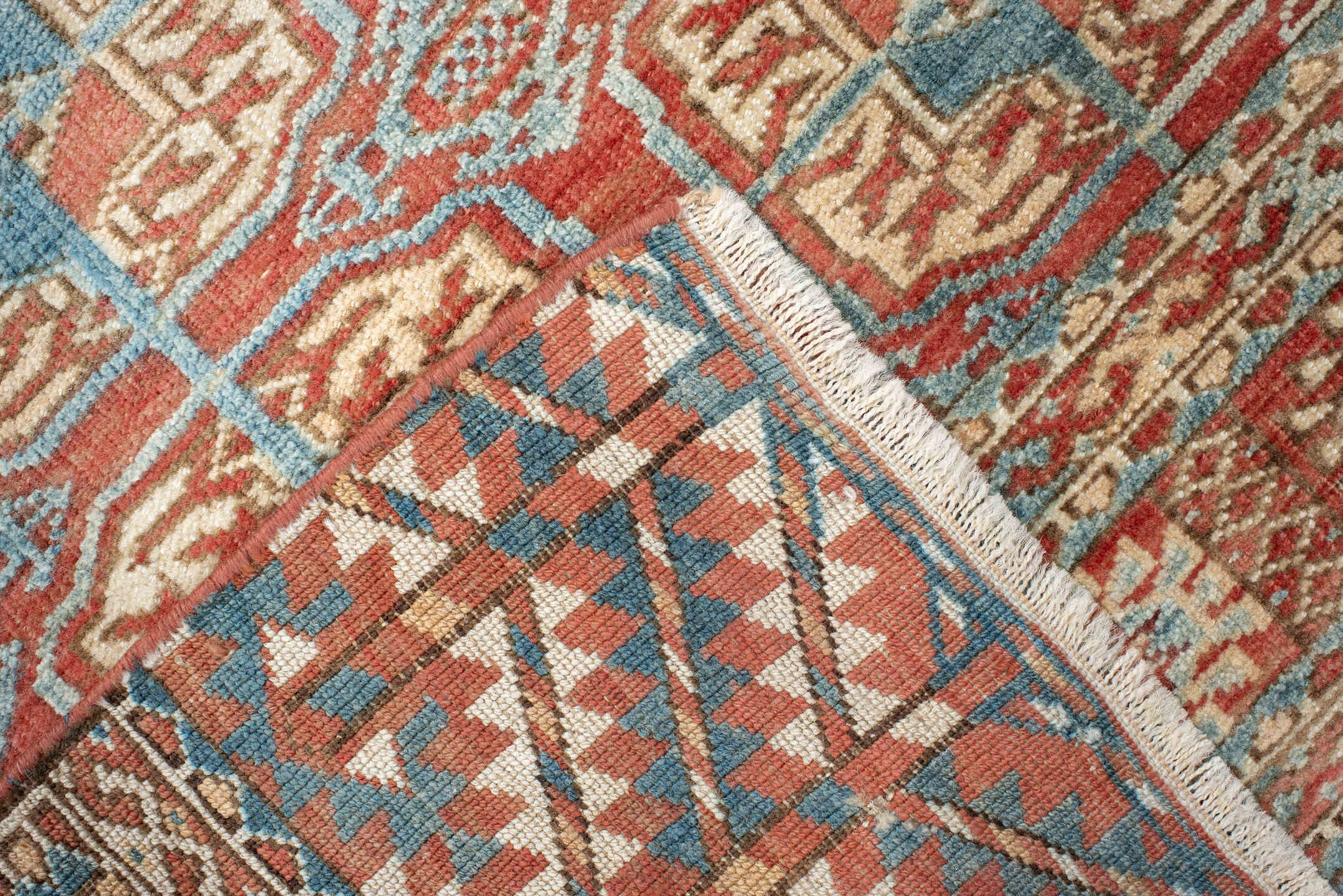 3' x 4' one-of-a-kind handmade antique Bokara small size rug. Color palette: coral, ivory, sky_blue, rust, camel, terracotta