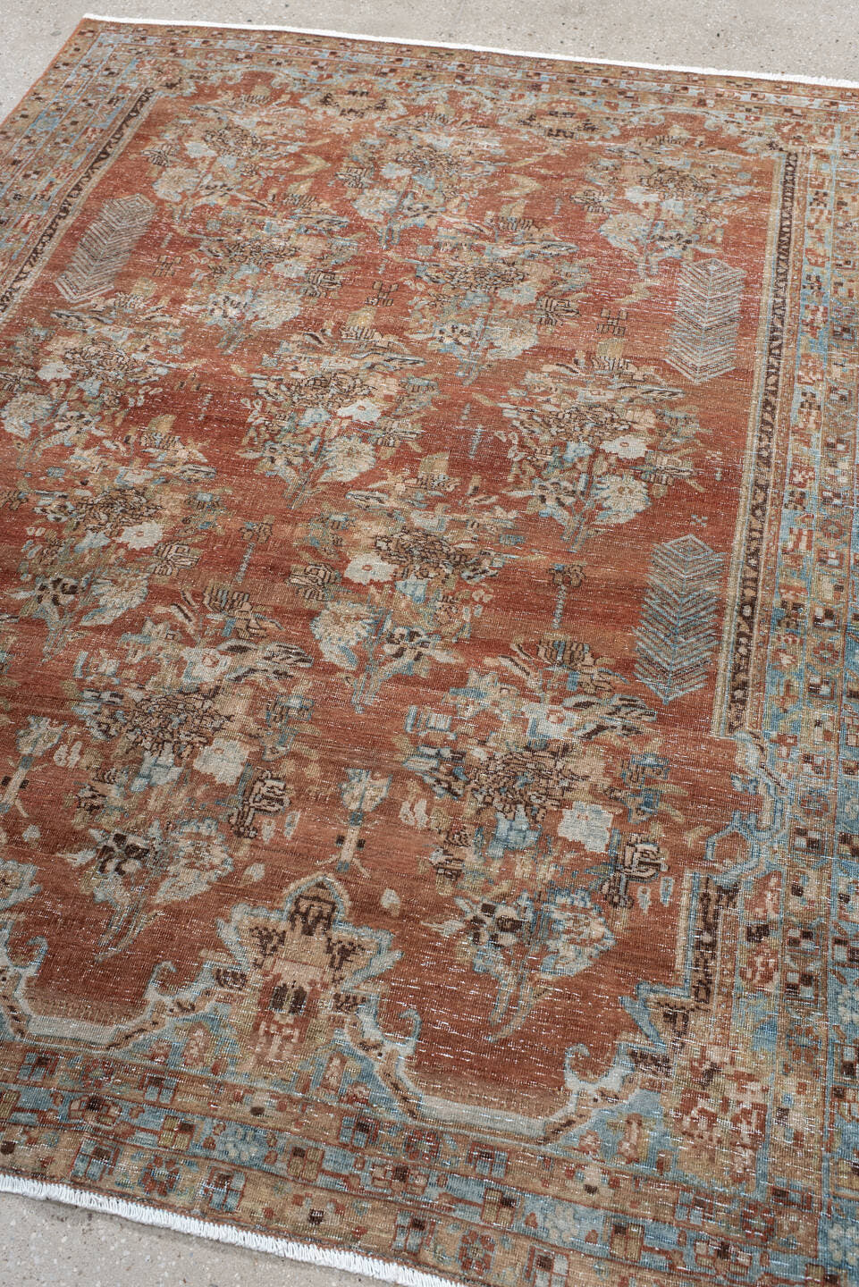 5' x 6' one-of-a-kind handmade vintage Afshar rug. Color palette: terra cotta, sky blue, ivory, taupe, brown, charcoal