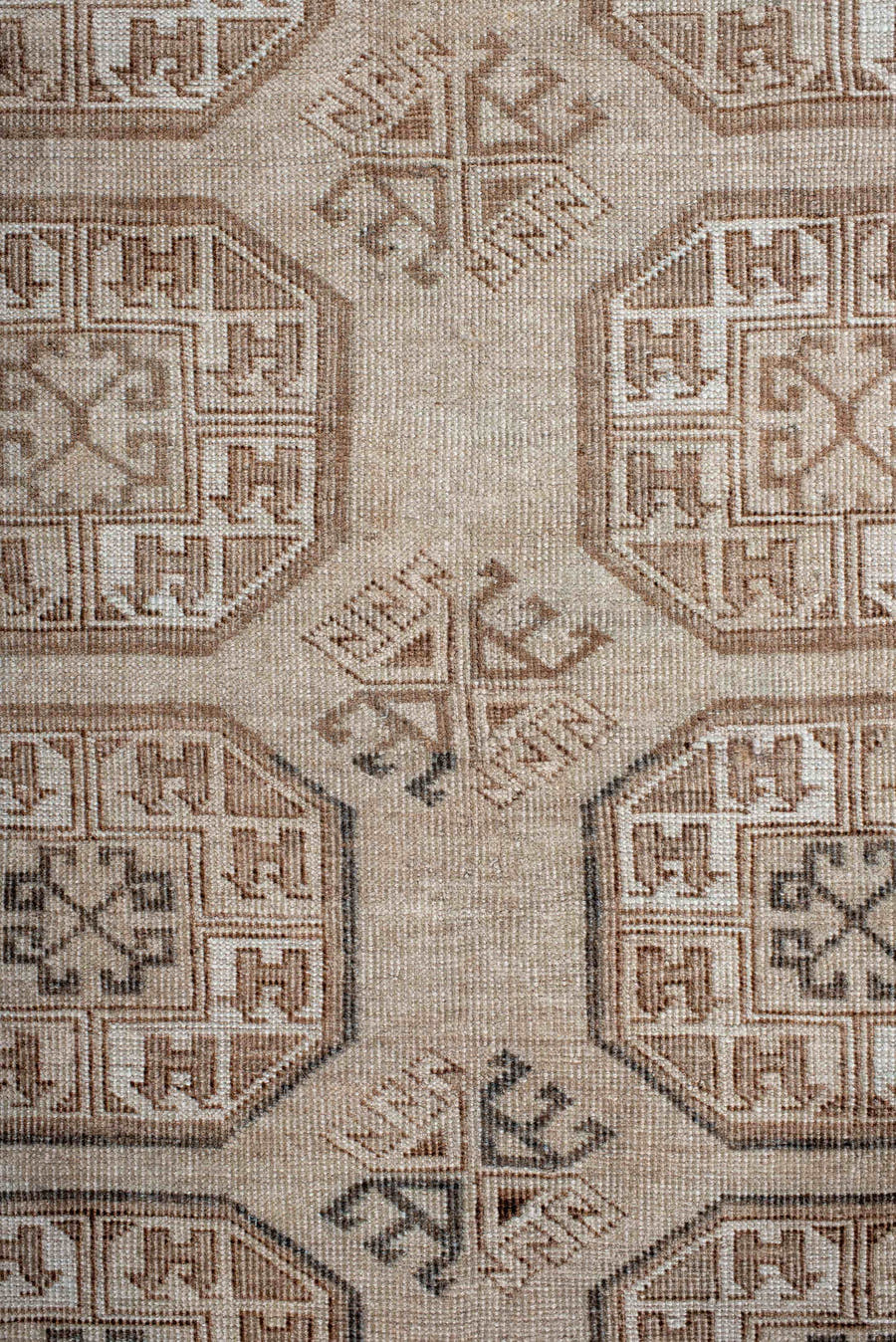 5' x 7' one-of-a-kind handmade antique Afghan rug. Color palette: ivory, taupe, camel, brown, charcoal, beige, gray, black