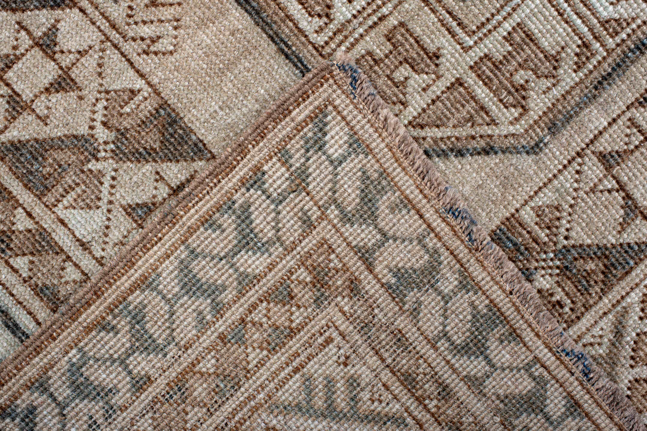 5' x 7' one-of-a-kind handmade antique Afghan rug. Color palette: ivory, taupe, camel, brown, charcoal, beige, gray, black