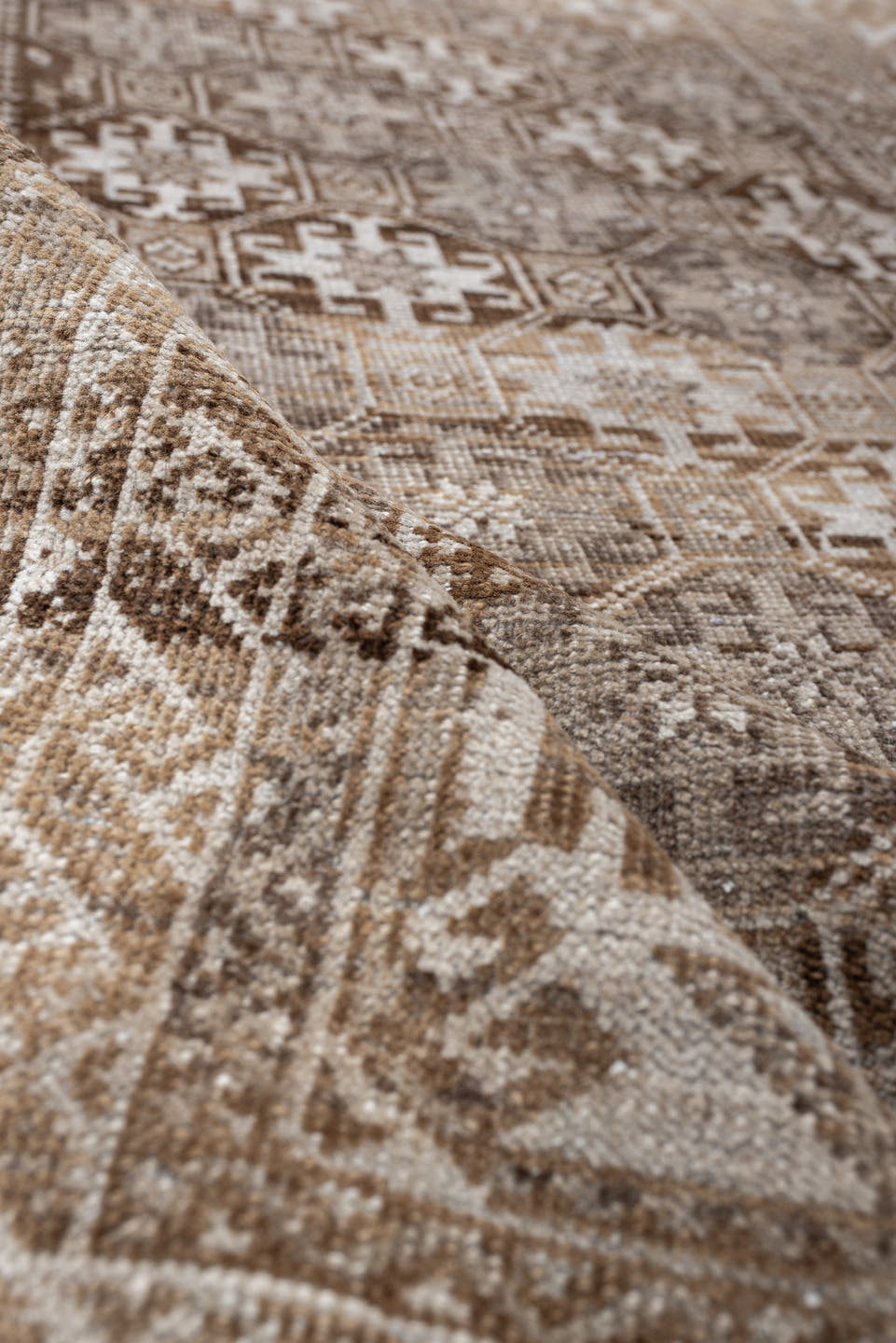 6' x 3' one-of-a-kind handmade antique Belouch rug. Color palette: camel, ivory, taupe, brown, sand, beige, gray