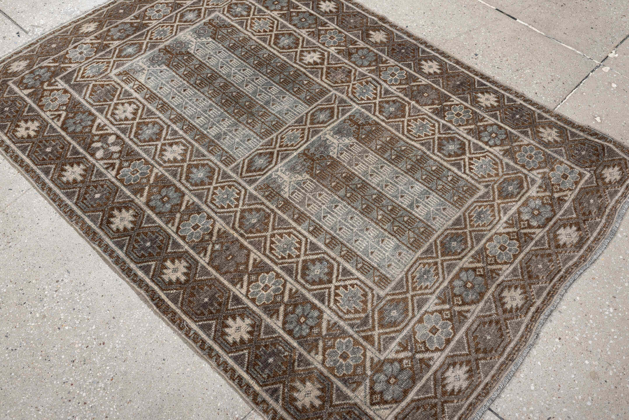 3' x 4' one-of-a-kind handmade antique Belouch small size rug. Color palette: camel, taupe, ivory, brown, gray, blue gray