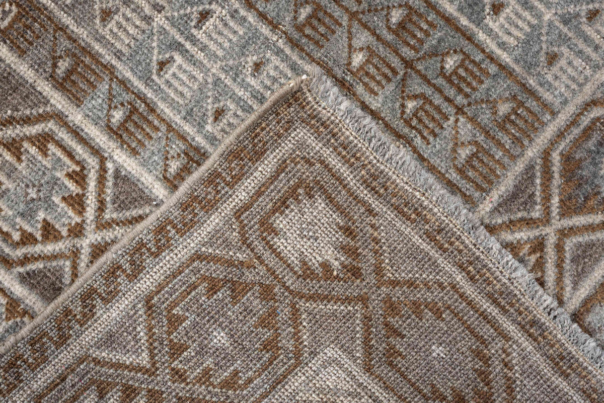 3' x 4' one-of-a-kind handmade antique Belouch small size rug. Color palette: camel, taupe, ivory, brown, gray, blue gray