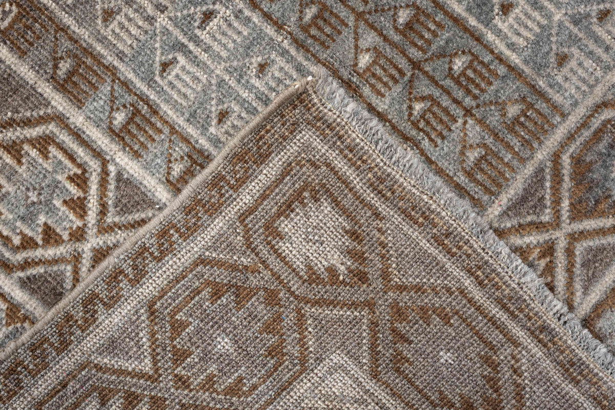 3' x 4' one-of-a-kind handmade antique Belouch small size rug. Color palette: camel, taupe, ivory, brown, gray, blue gray