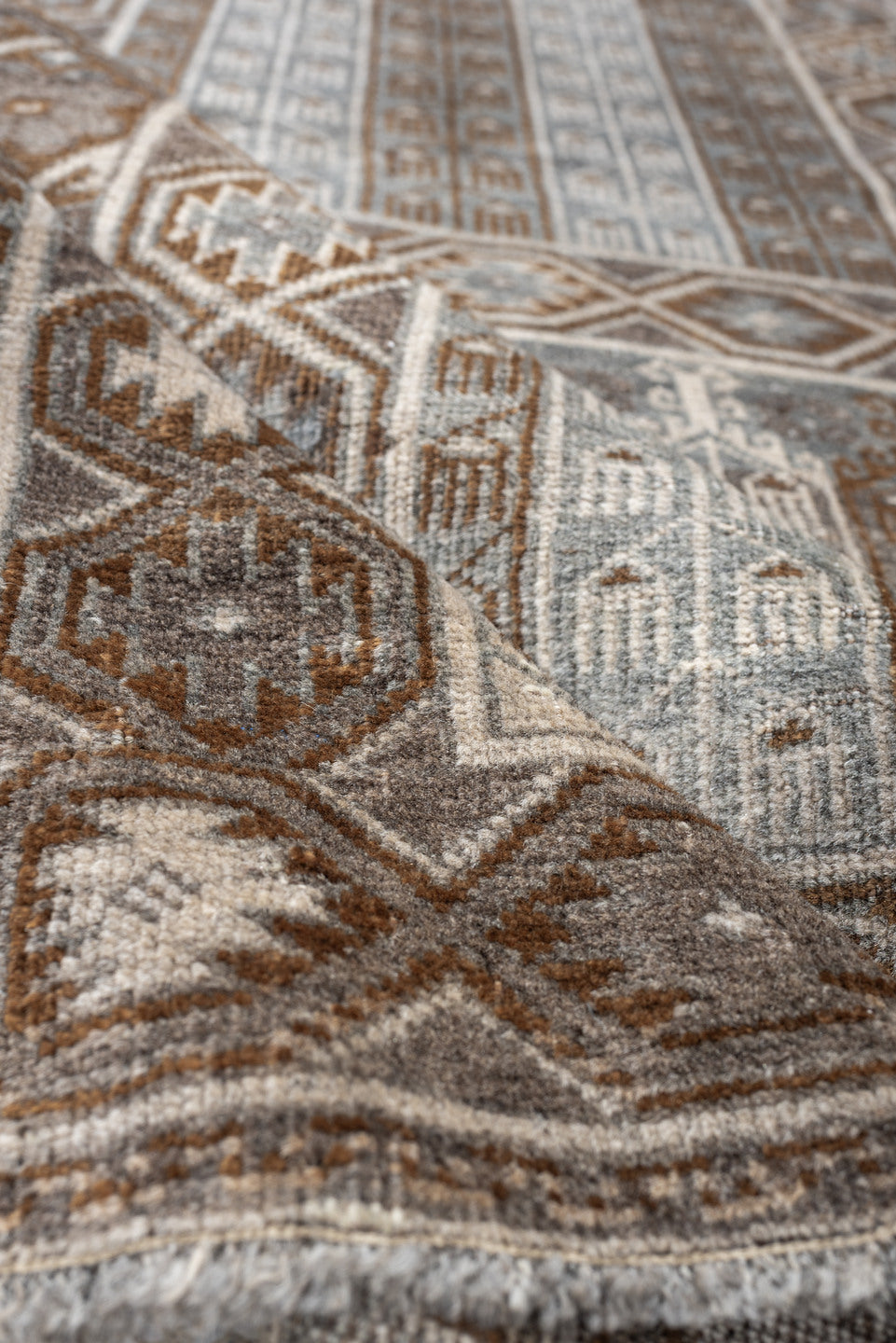 3' x 4' one-of-a-kind handmade antique Belouch small size rug. Color palette: camel, taupe, ivory, brown, gray, blue gray