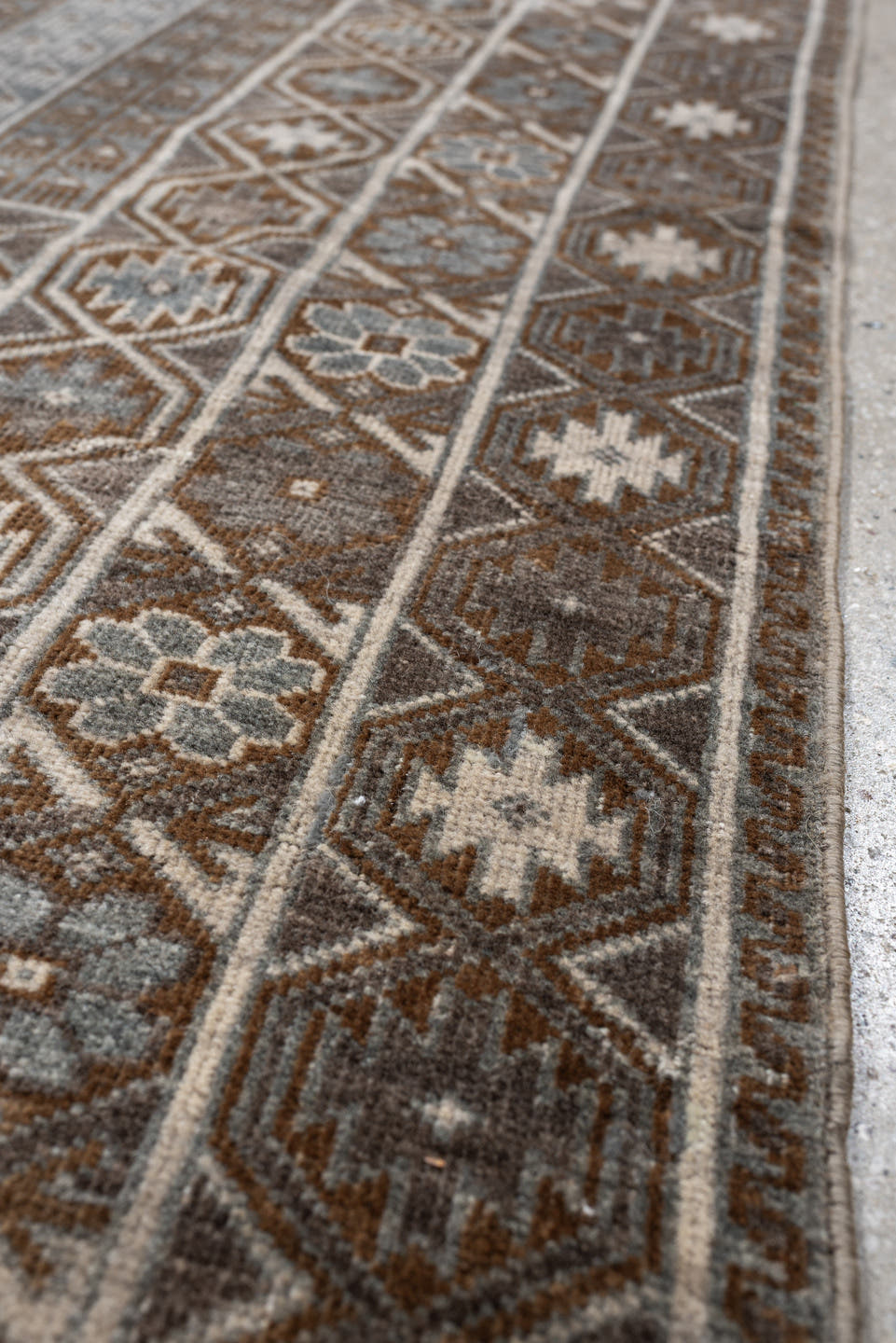 3' x 4' one-of-a-kind handmade antique Belouch small size rug. Color palette: camel, taupe, ivory, brown, gray, blue gray