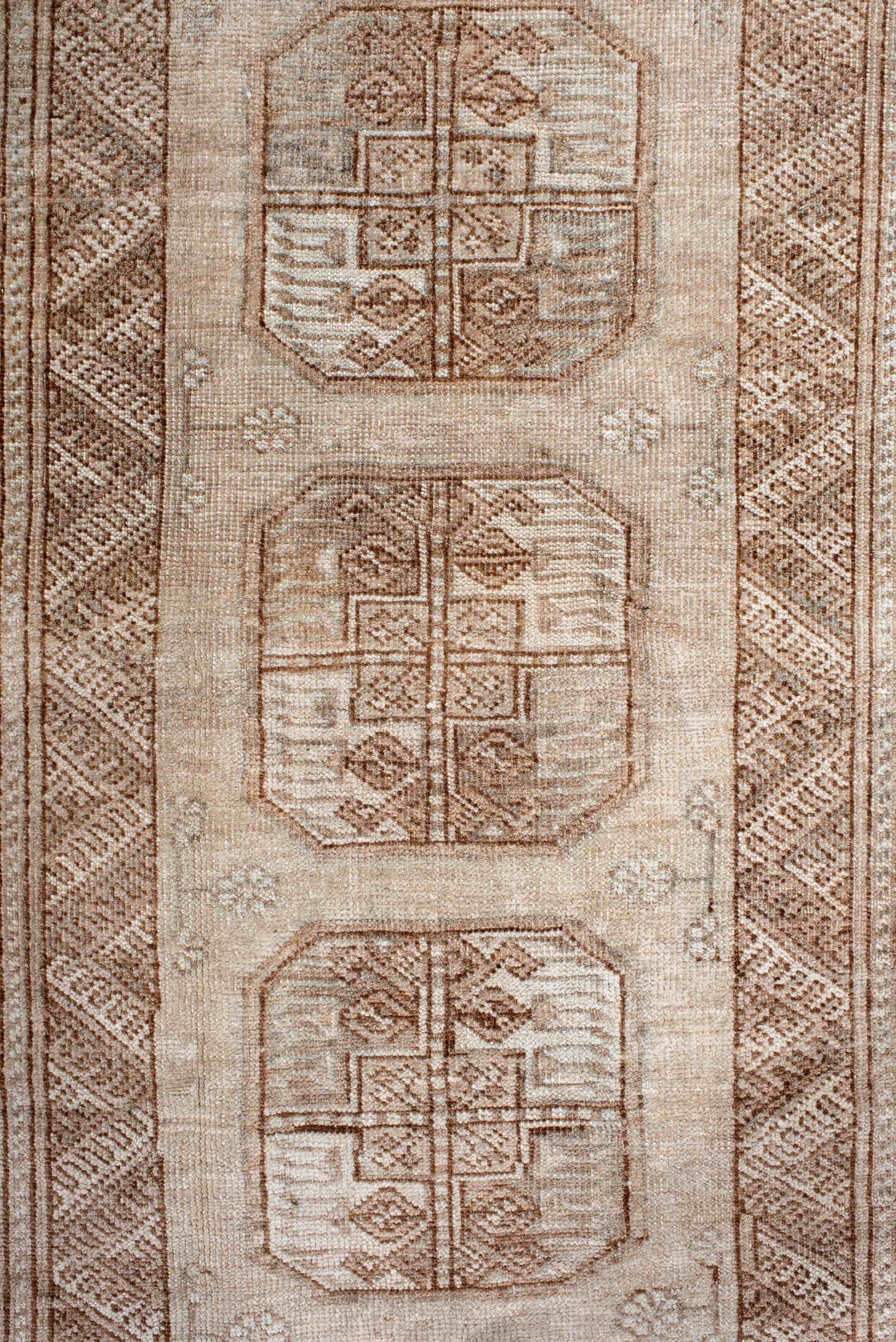 3' x 6' one-of-a-kind handmade antique Afghan small size rug. Color palette: camel, ivory, taupe, beige, sand, gray