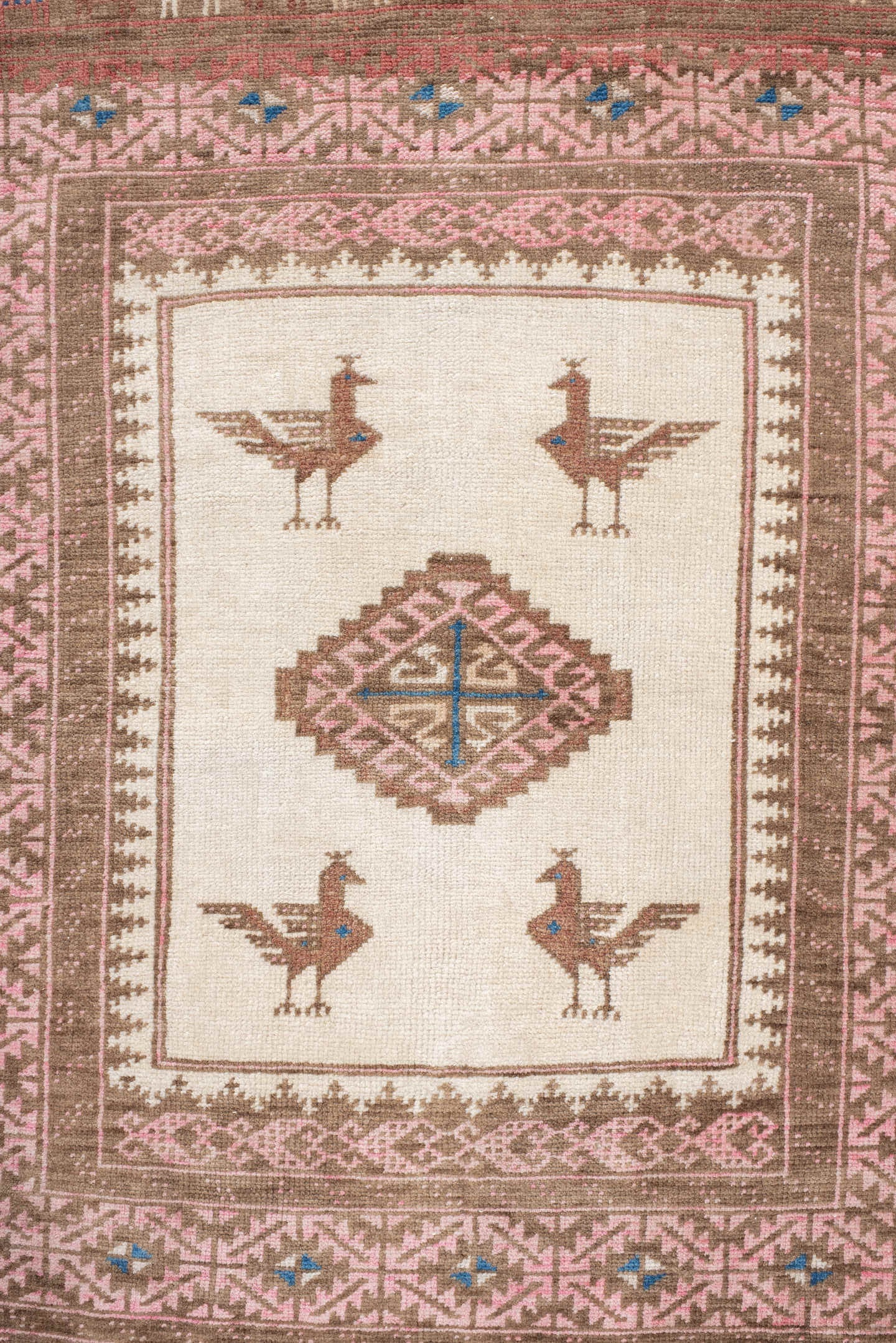 2' x 4' one-of-a-kind handmade antique Belouch small size rug. Color palette: brown, rose, ivory, taupe, blue, camel, pink