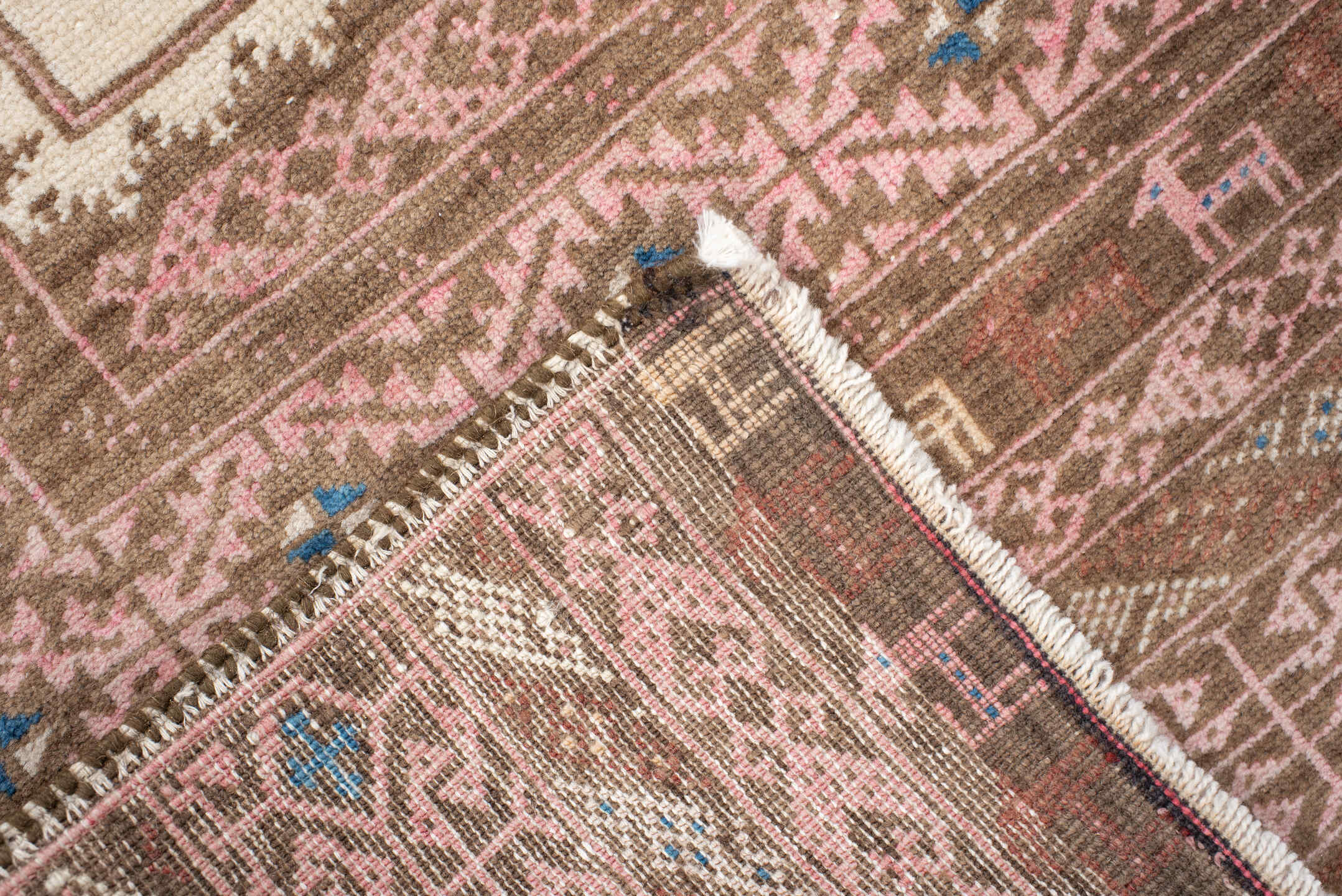 2' x 4' one-of-a-kind handmade antique Belouch small size rug. Color palette: brown, rose, ivory, taupe, blue, camel, pink