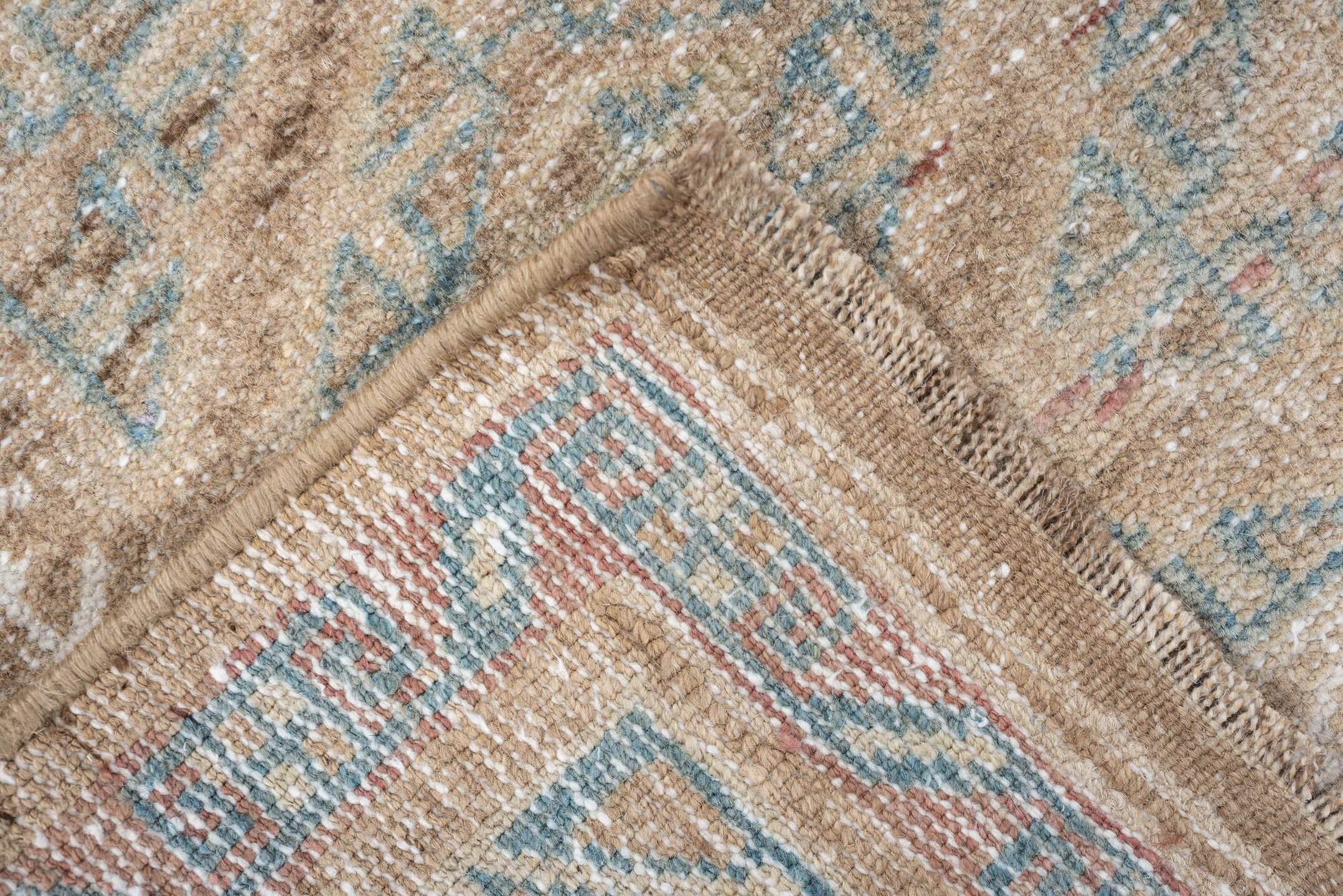 2' x 4' one-of-a-kind handmade antique Belouch small size rug. Color palette: camel, ivory, faded teal, taupe, muted rust