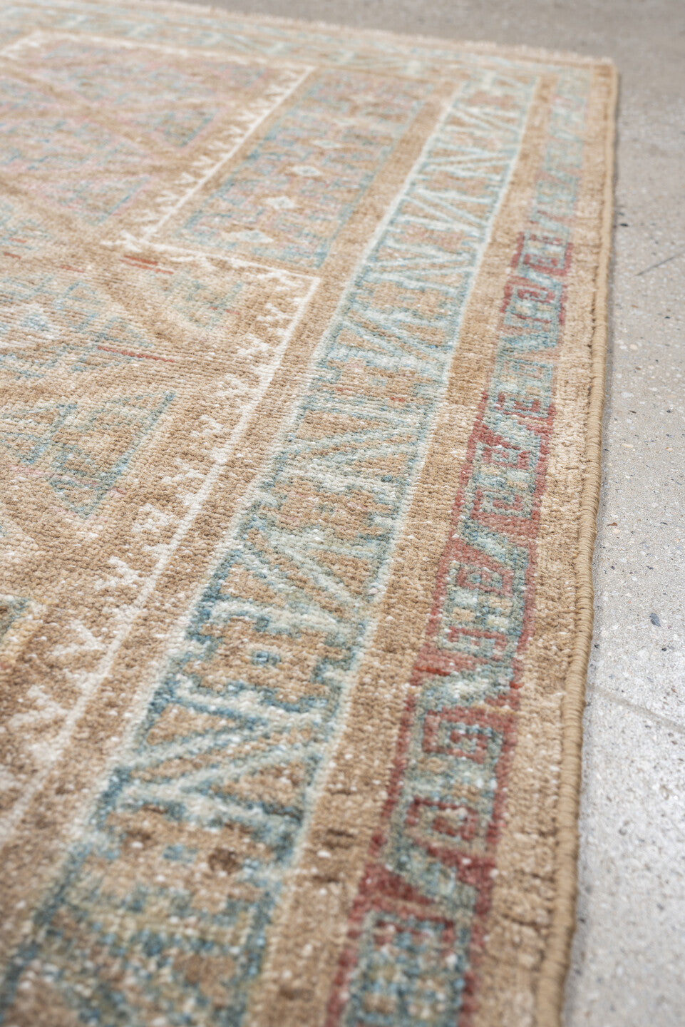2' x 4' one-of-a-kind handmade antique Belouch small size rug. Color palette: camel, ivory, faded teal, taupe, muted rust