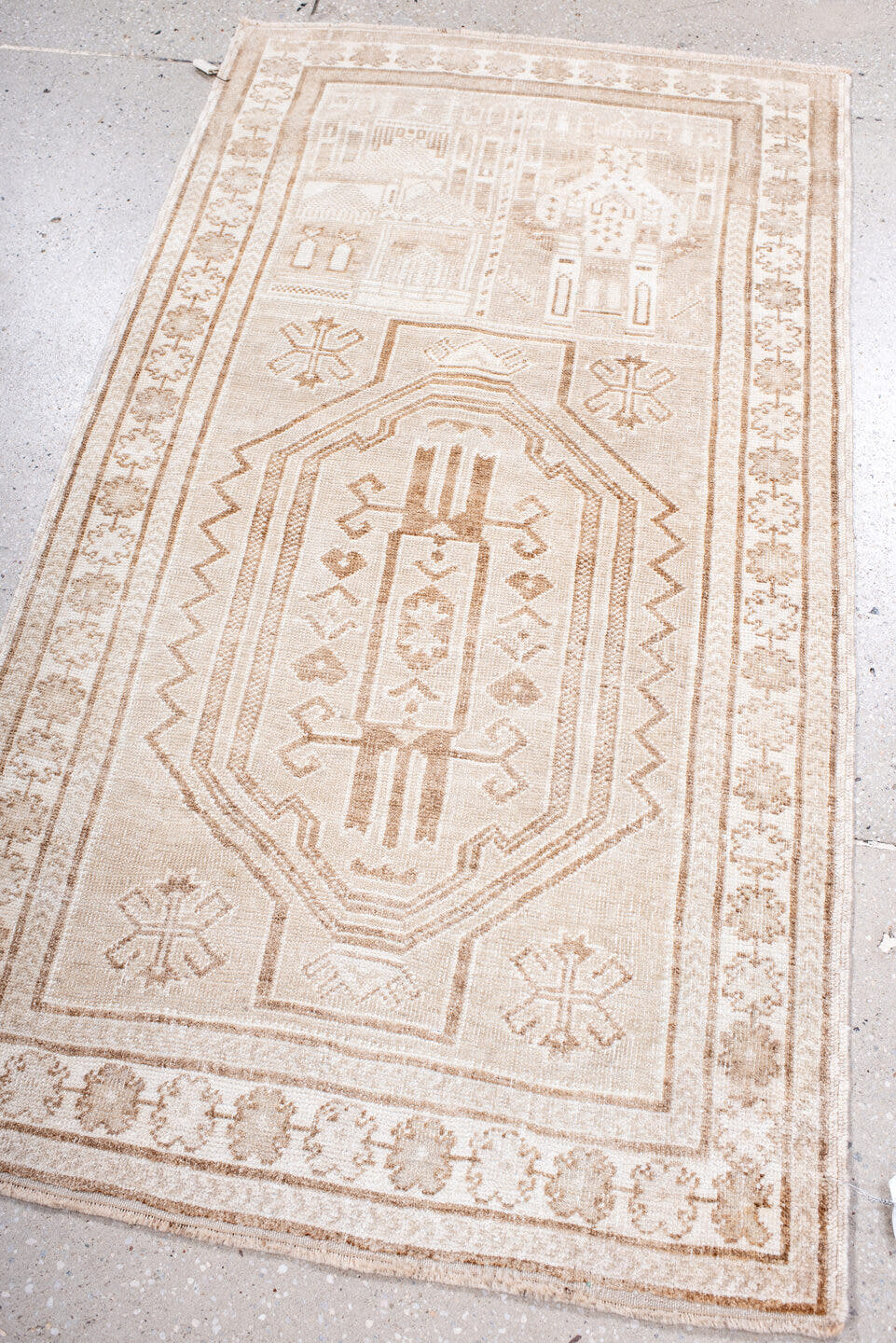 2' x 4' one-of-a-kind handmade antique Belouch small size rug. Color palette: ivory, beige, taupe, camel, sand, gray