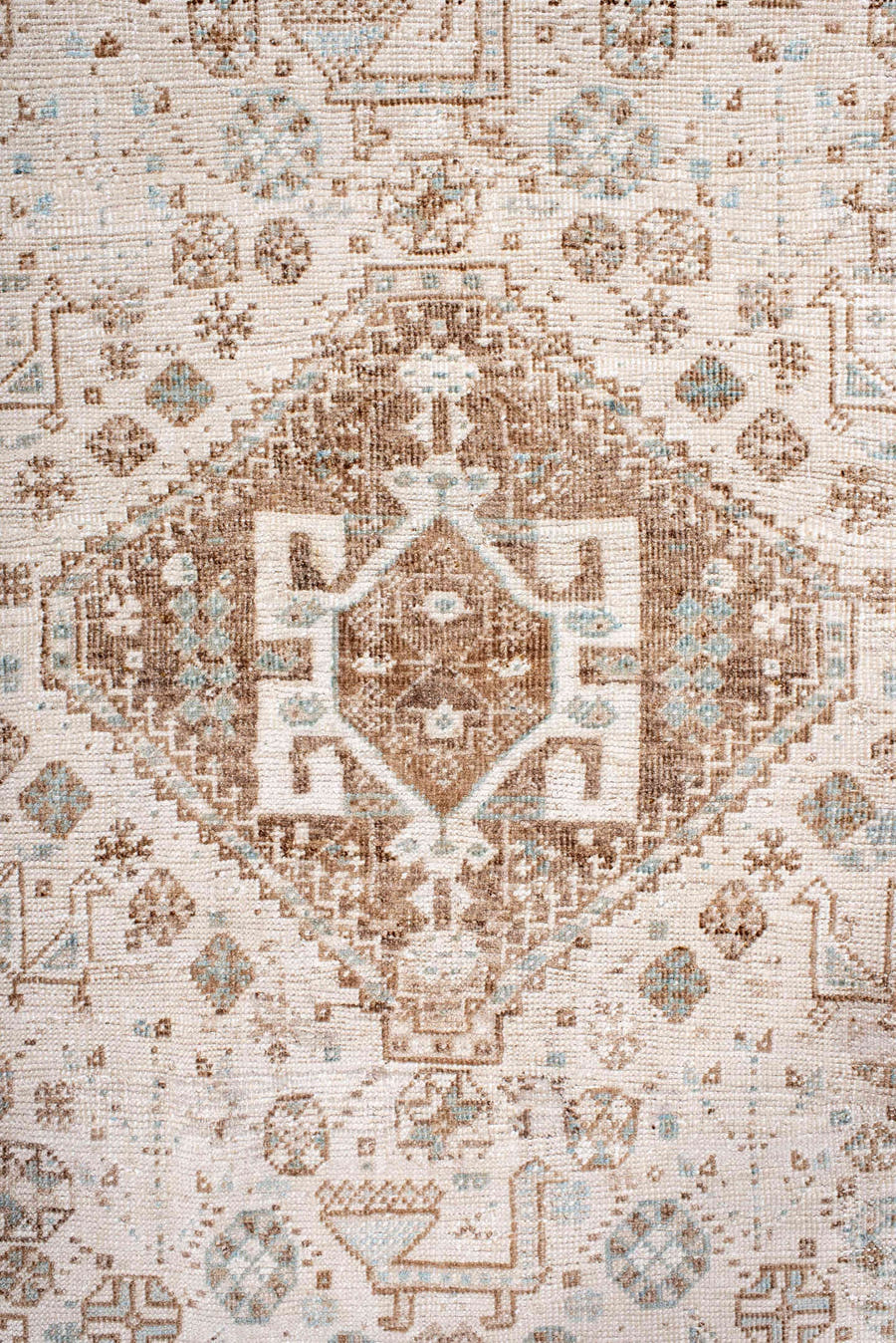 6' x 10' one-of-a-kind handmade antique Shiraz large size rug. Color palette: ivory, camel, taupe, pale blue, cream, sand