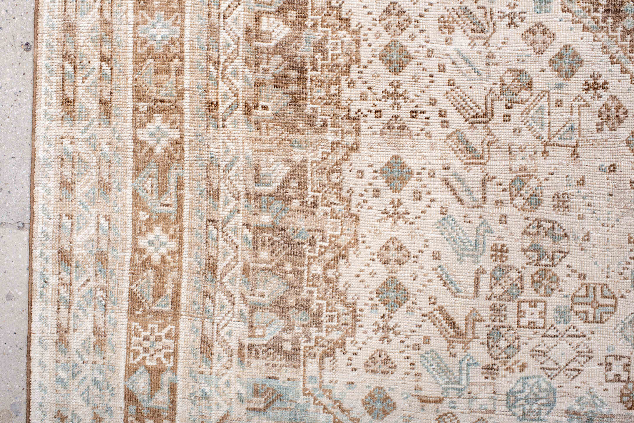6' x 10' one-of-a-kind handmade antique Shiraz large size rug. Color palette: ivory, camel, taupe, pale blue, cream, sand