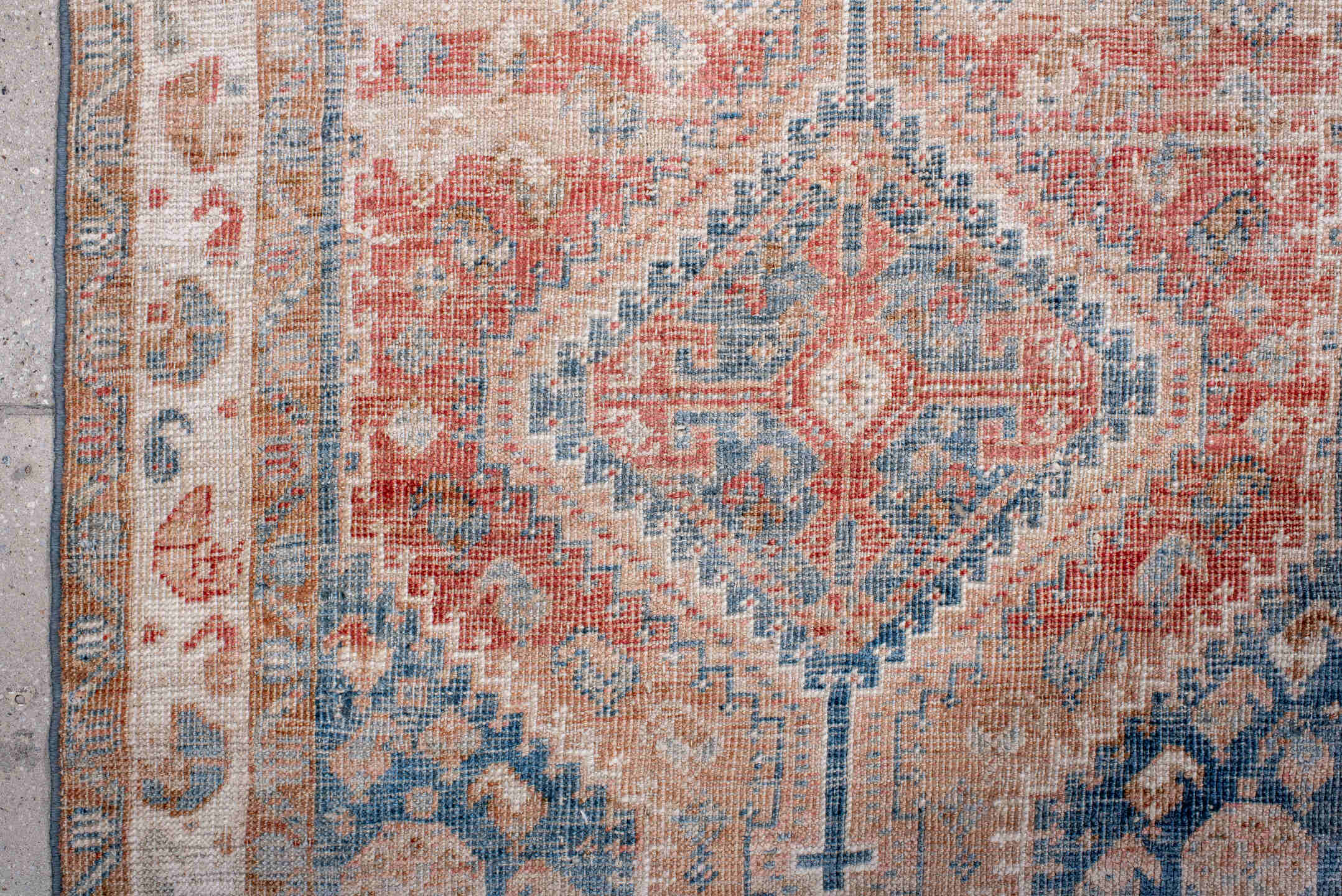 2' x 4' one-of-a-kind handmade antique Shiraz small size rug. Color palette: ivory, sky blue, coral, peach, faded red, beige