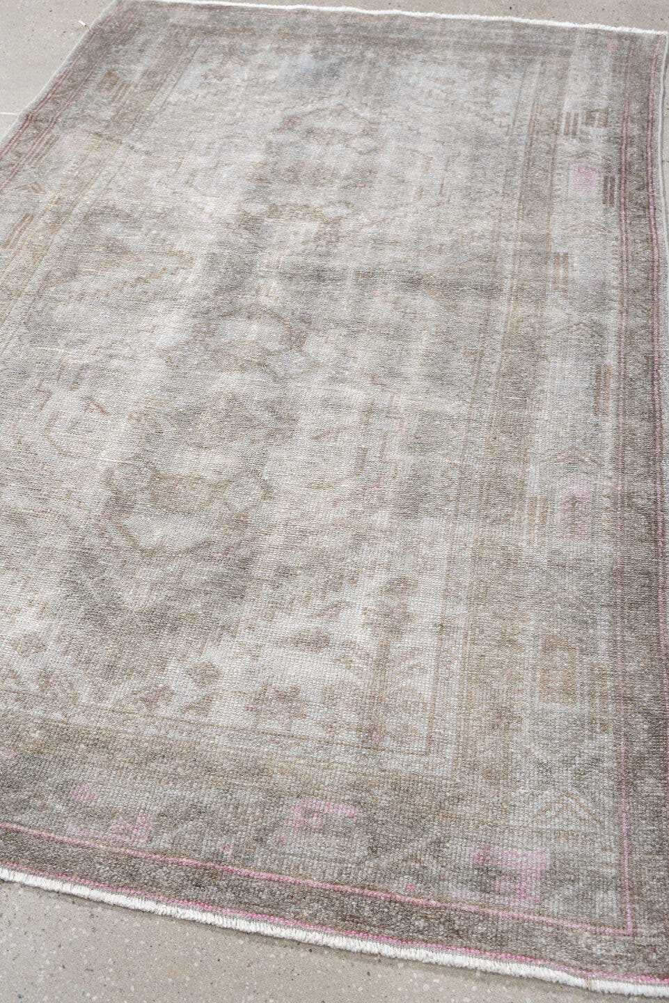 4' x 6' one-of-a-kind handmade antique rug. Color palette: ivory, taupe, blush, sand, pale gray, beige, gray, pink