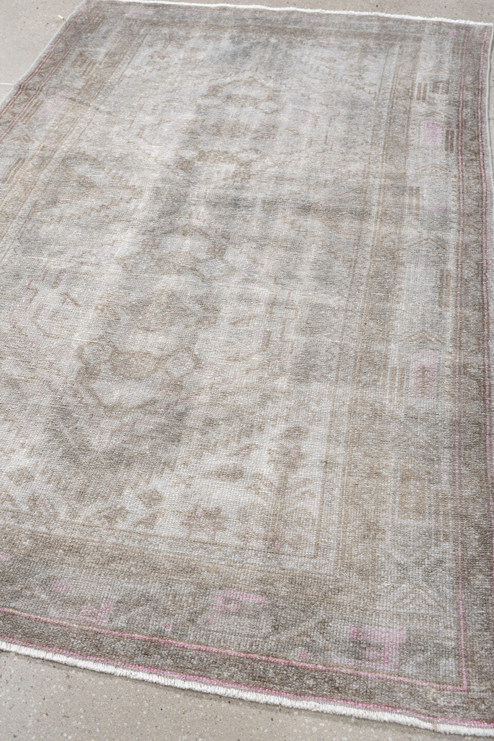 4' x 6' one-of-a-kind handmade antique rug. Color palette: ivory, taupe, blush, sand, pale gray, beige, gray, pink