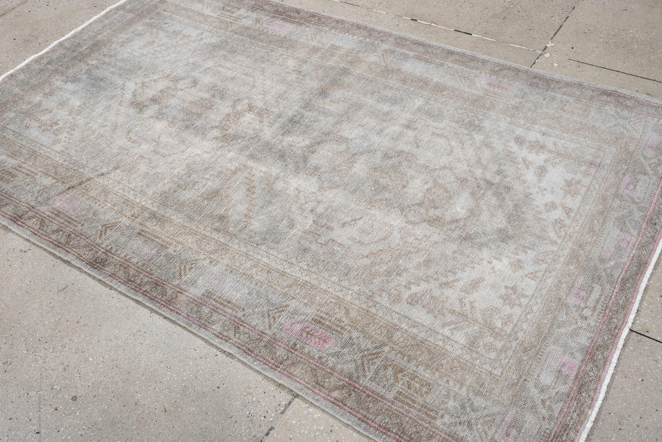 4' x 6' one-of-a-kind handmade antique rug. Color palette: ivory, taupe, blush, sand, pale gray, beige, gray, pink