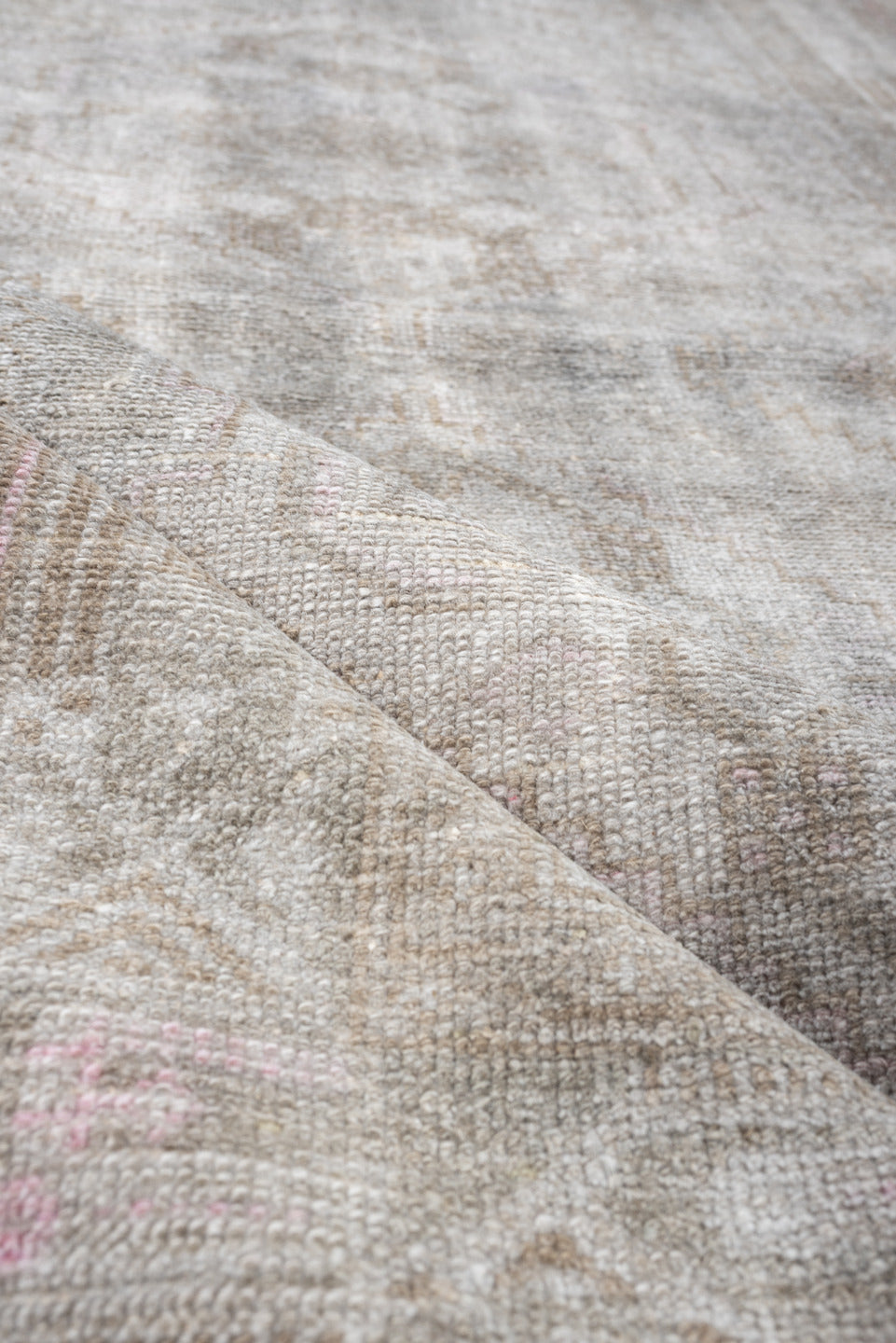 4' x 6' one-of-a-kind handmade antique rug. Color palette: ivory, taupe, blush, sand, pale gray, beige, gray, pink