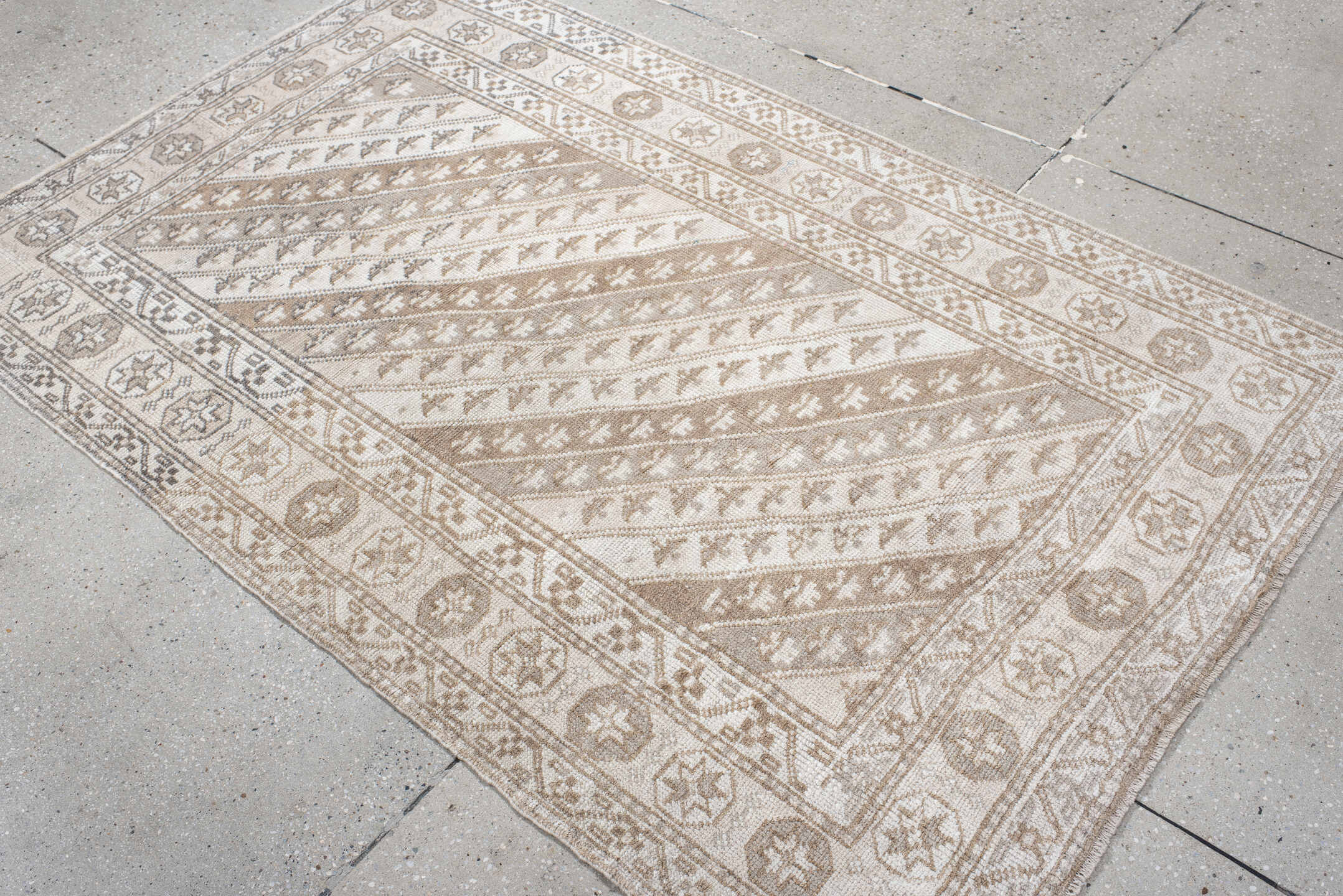 3' x 6' one-of-a-kind handmade antique Anatolian small size rug. Color palette: ivory, beige, taupe, sand, camel