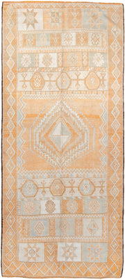 5' x 11' one-of-a-kind handmade antique Moroccan rug. Color palette: apricot, ivory, pale blue, sand, cream, terracotta