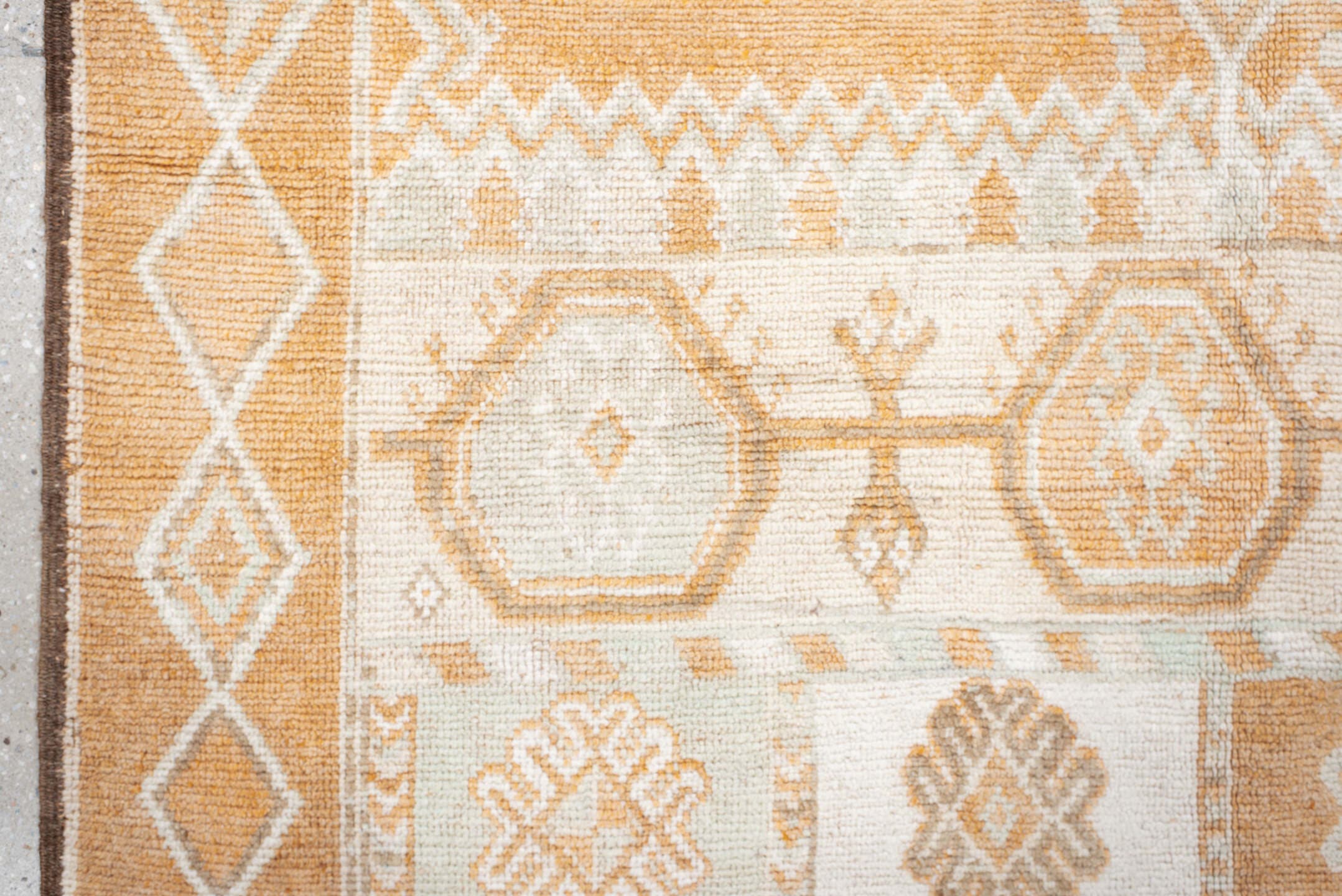 5' x 11' one-of-a-kind handmade antique Moroccan rug. Color palette: apricot, ivory, pale blue, sand, cream, terracotta