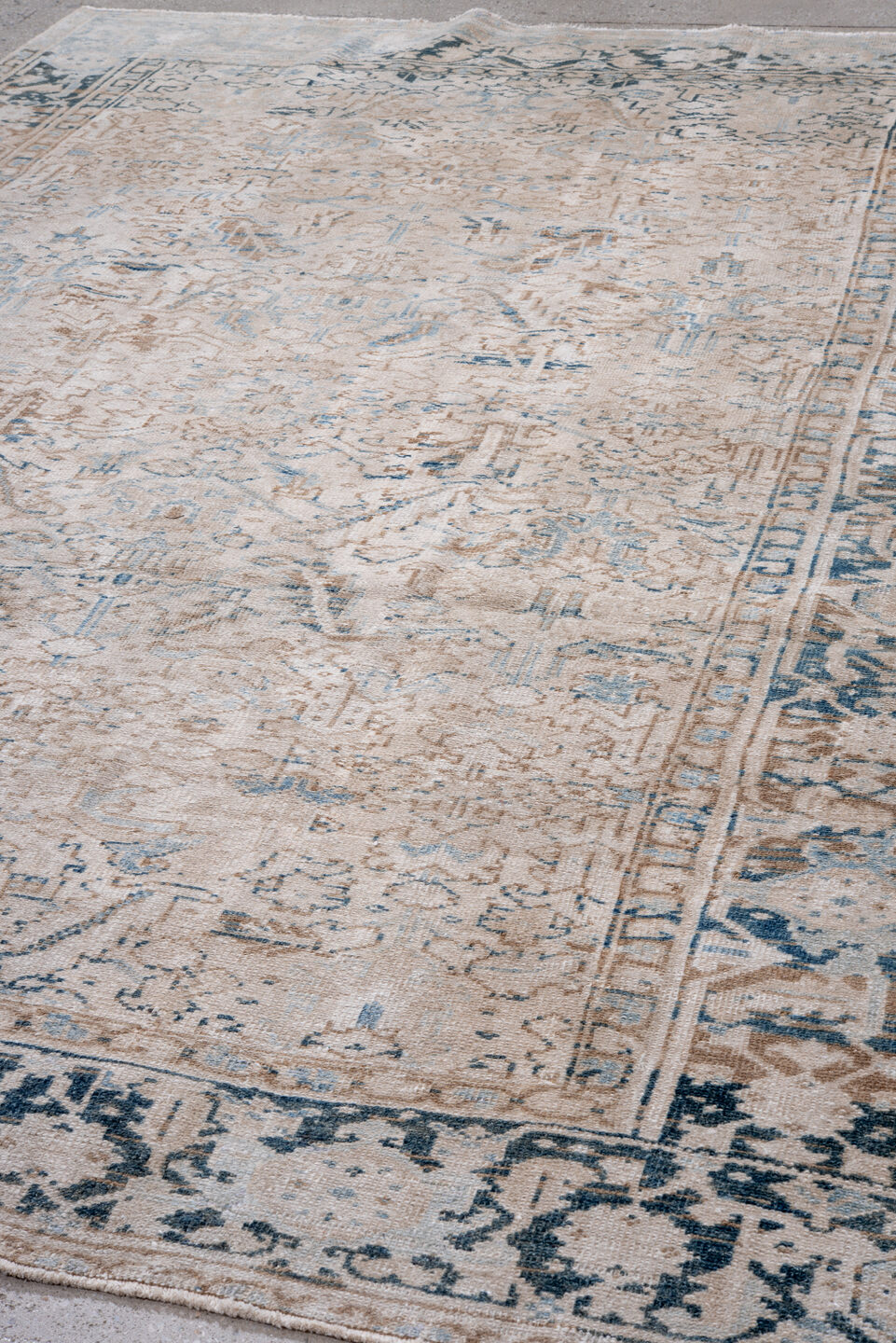 7' x 10' one-of-a-kind handmade vintage Heriz large size rug. Color palette: ivory, sky blue, taupe, slate, beige, charcoal