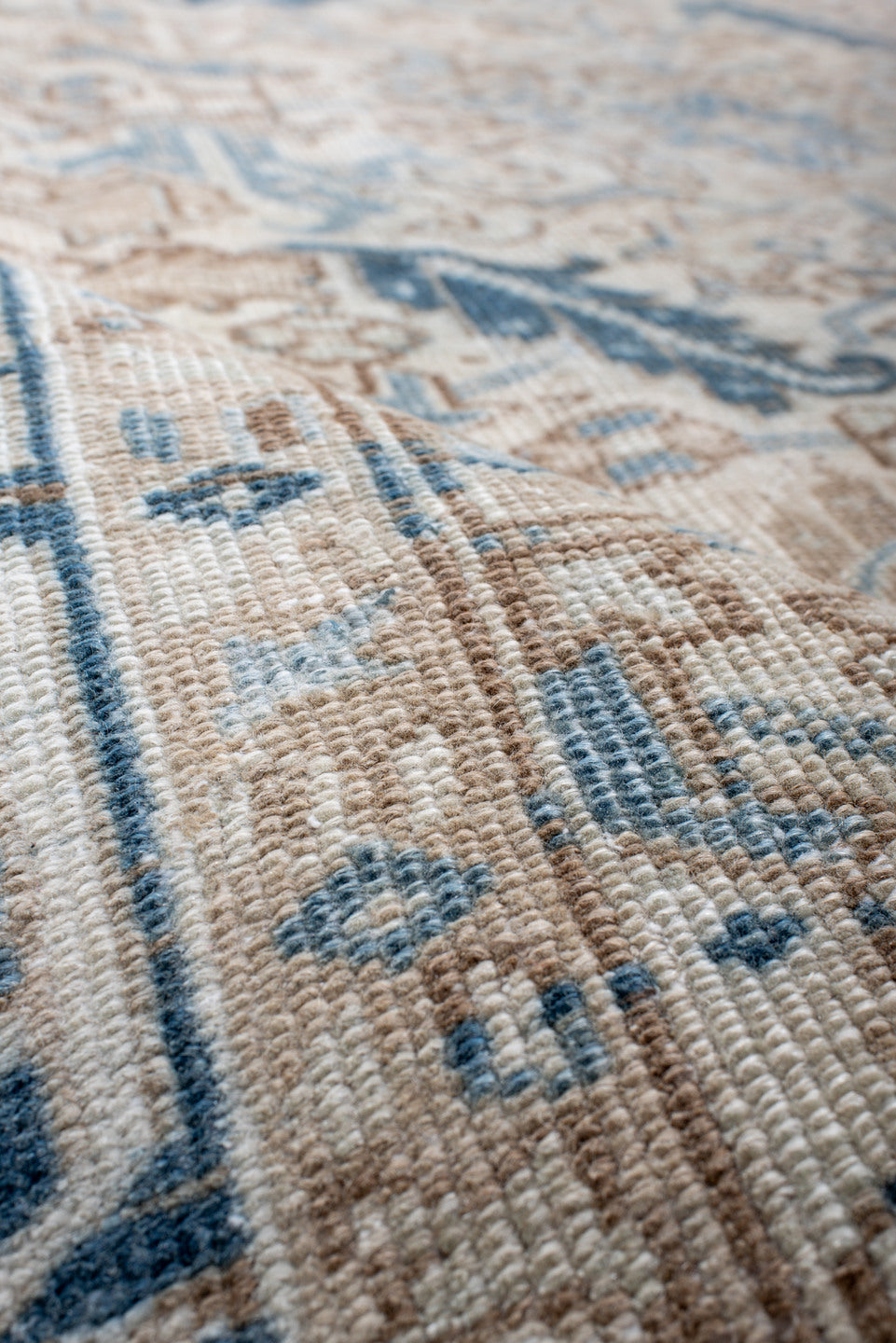 6' x 9' one-of-a-kind handmade antique Heriz rug. Color palette: ivory, sky blue, beige, navy, taupe, light blue, blue, gray