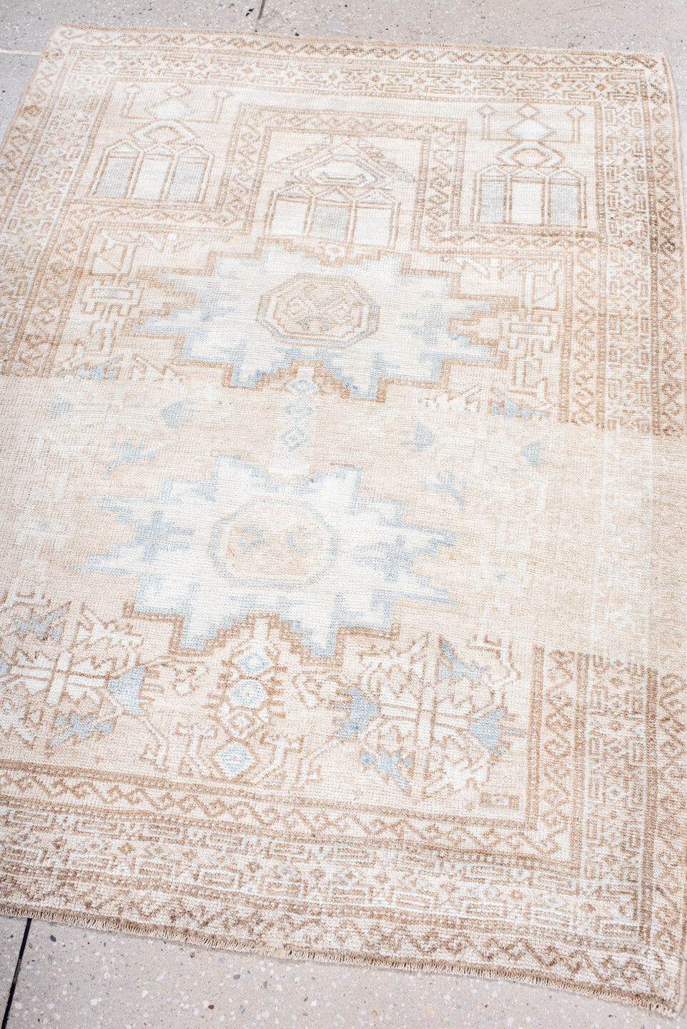 3' x 4' one-of-a-kind handmade antique Belouch small size rug. Color palette: ivory, camel, pale blue, beige, taupe