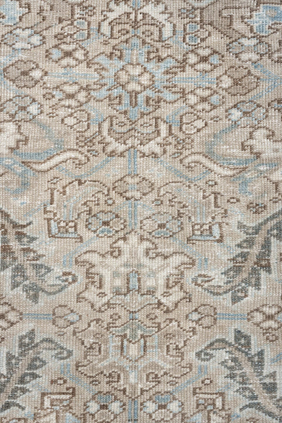 7' x 9' one-of-a-kind handmade vintage Heriz rug. Color palette: ivory, pale blue, taupe, slate, light gray, beige
