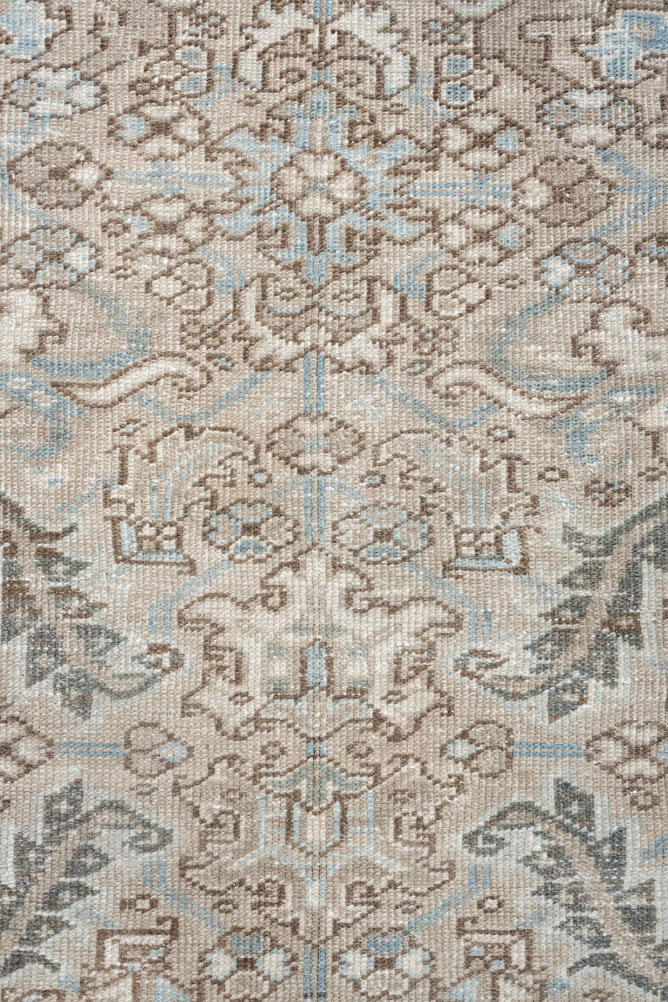 7' x 9' one-of-a-kind handmade vintage Heriz rug. Color palette: ivory, pale blue, taupe, slate, light gray, beige