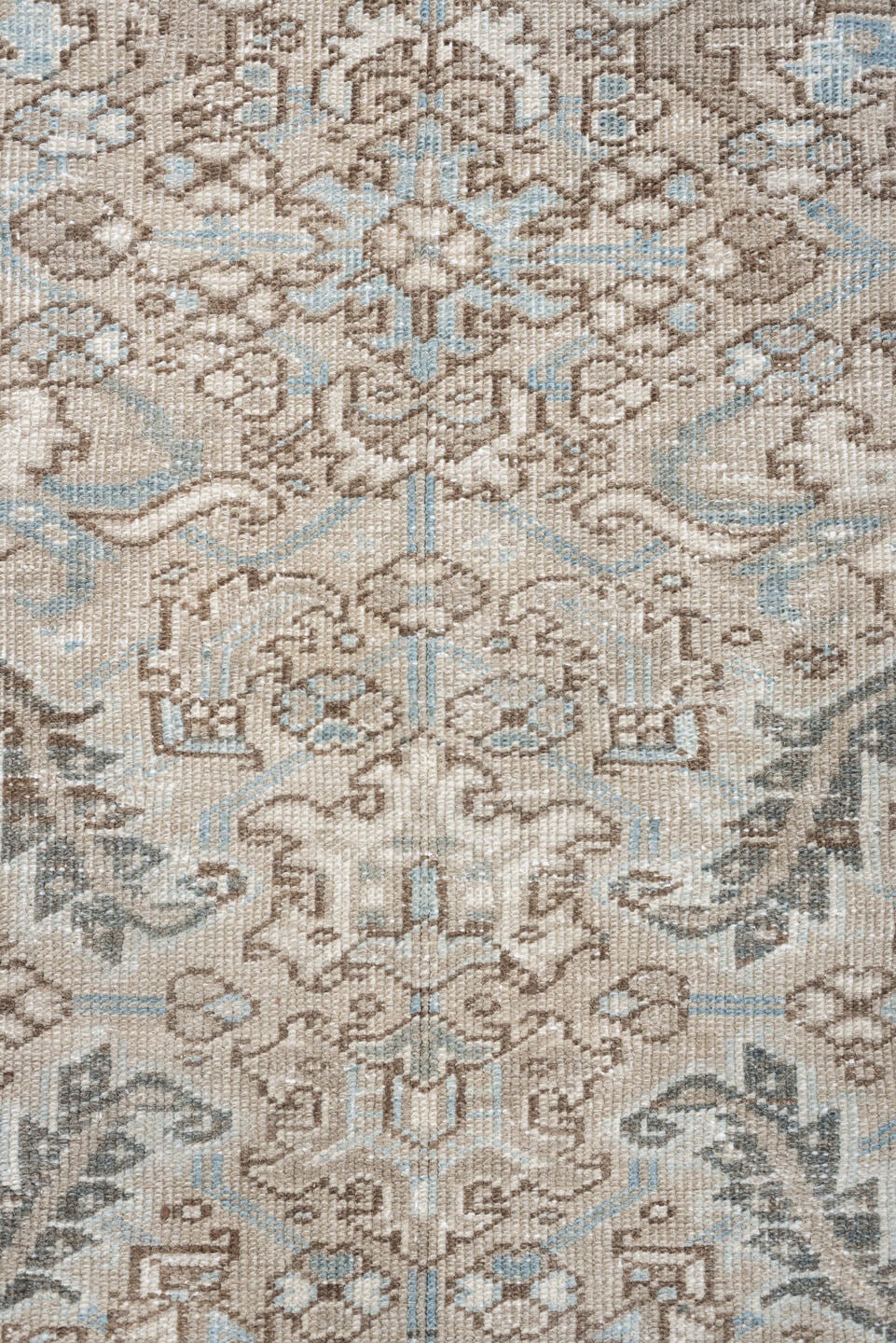 7' x 9' one-of-a-kind handmade vintage Heriz rug. Color palette: ivory, pale blue, taupe, slate, light gray, beige
