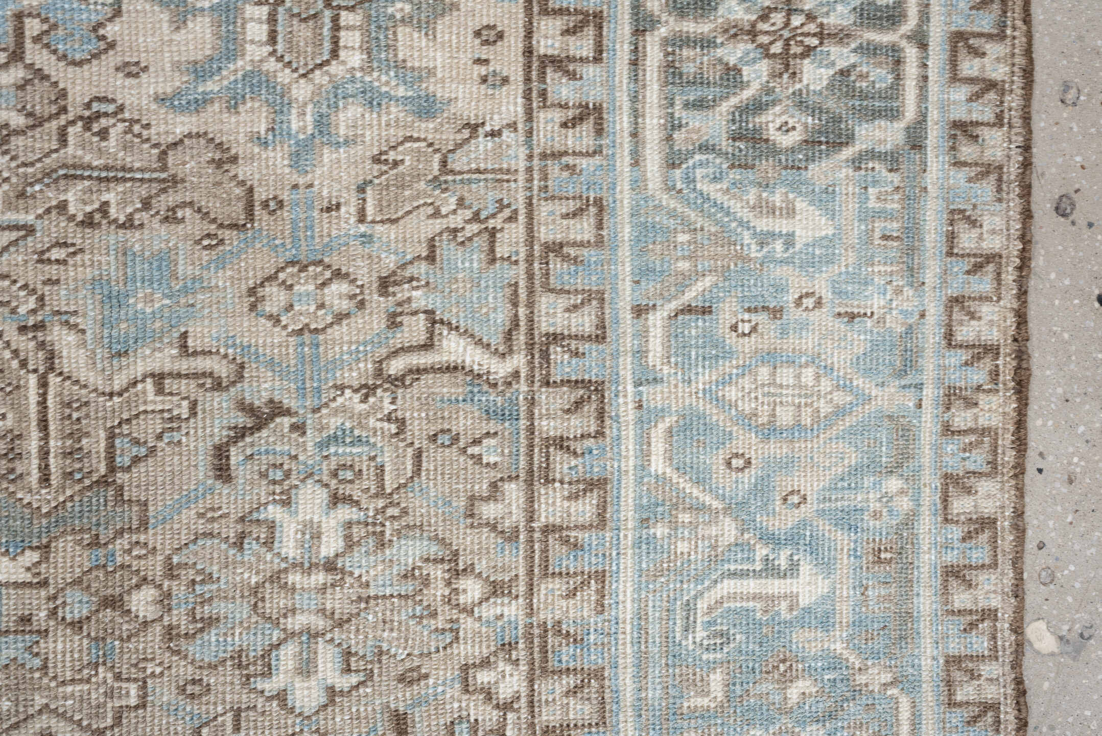 7' x 9' one-of-a-kind handmade vintage Heriz rug. Color palette: ivory, pale blue, taupe, slate, light gray, beige
