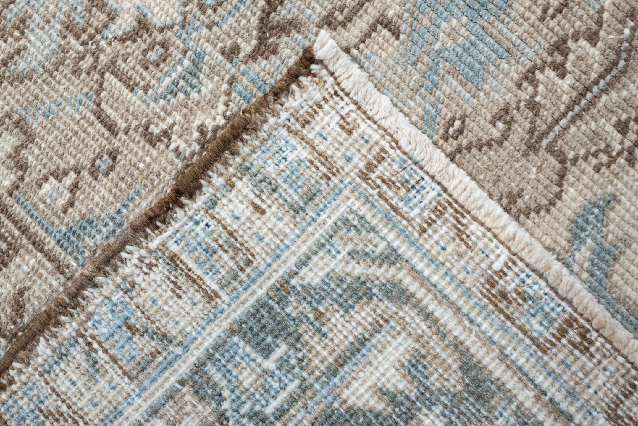 7' x 9' one-of-a-kind handmade vintage Heriz rug. Color palette: ivory, pale blue, taupe, slate, light gray, beige