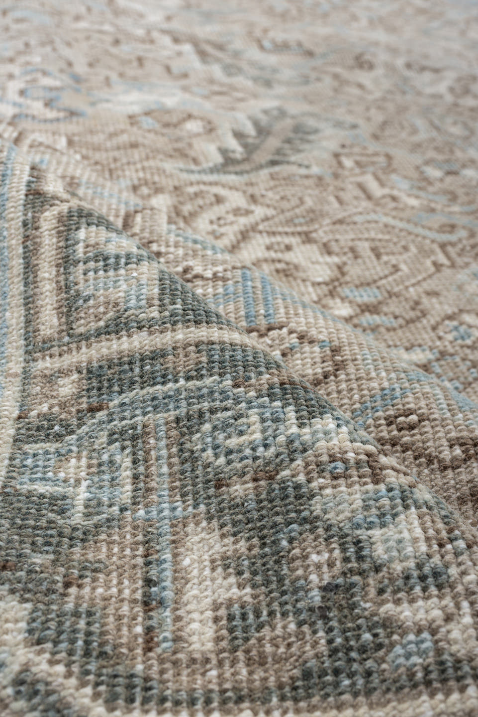 7' x 9' one-of-a-kind handmade vintage Heriz rug. Color palette: ivory, pale blue, taupe, slate, light gray, beige