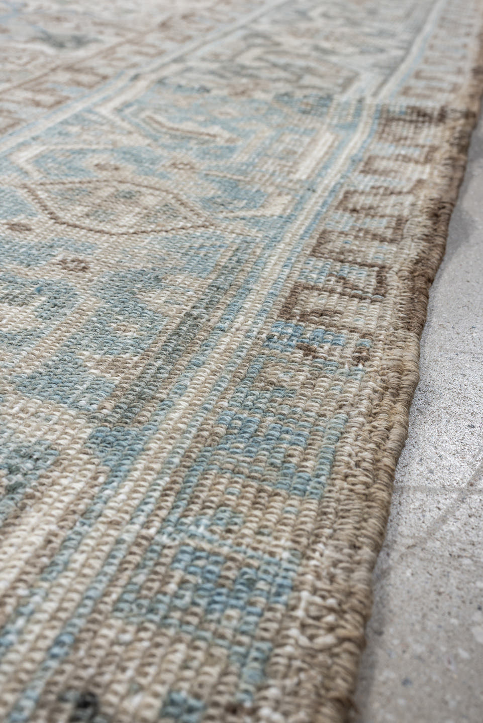 7' x 9' one-of-a-kind handmade vintage Heriz rug. Color palette: ivory, pale blue, taupe, slate, light gray, beige