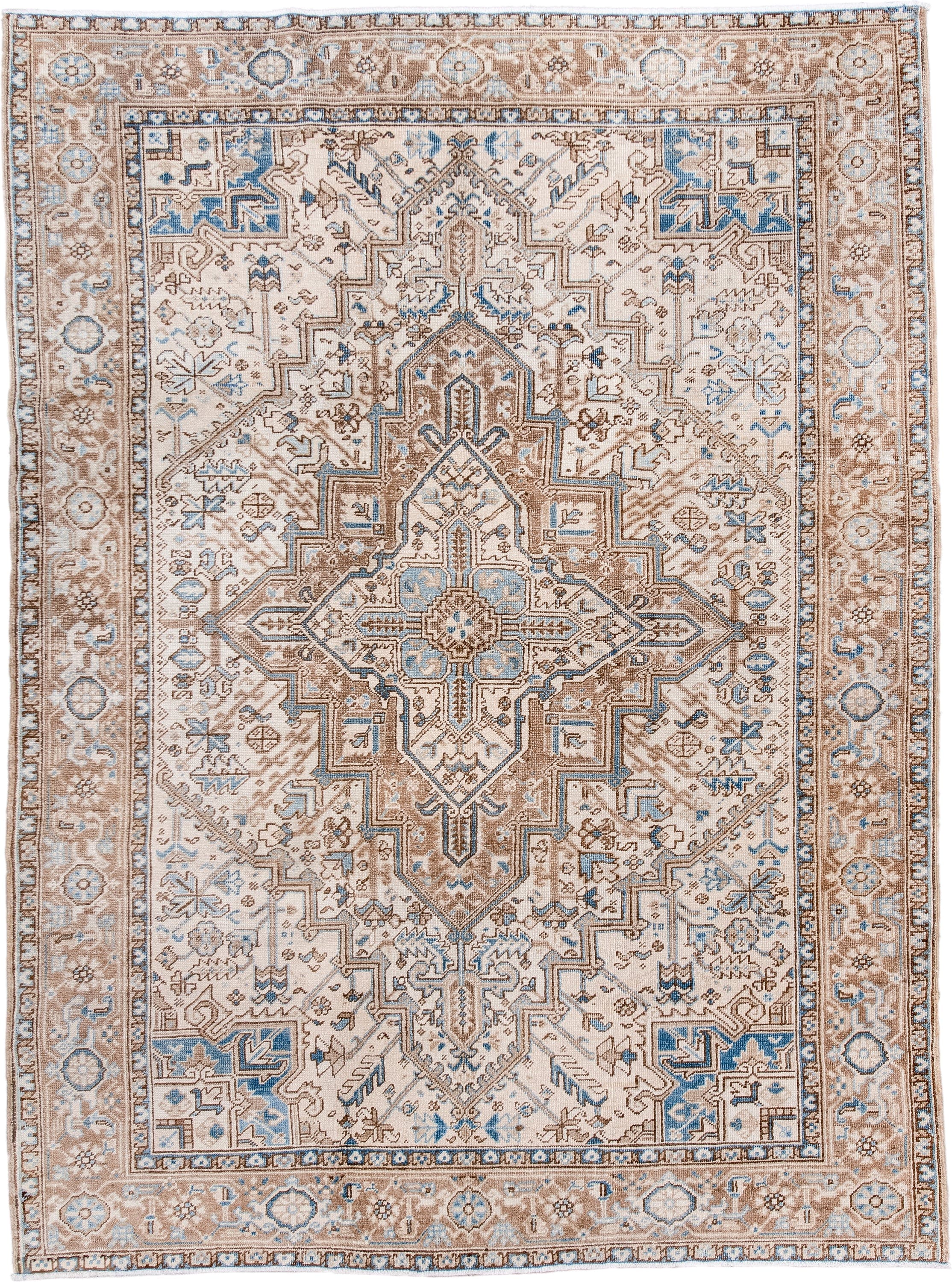 6' x 8' one-of-a-kind handmade antique Heriz medium size rug. Color palette: ivory, taupe, sky blue, camel, brown, beige