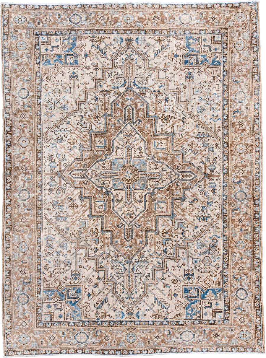 6' x 8' one-of-a-kind handmade antique Heriz medium size rug. Color palette: ivory, taupe, sky blue, camel, brown, beige