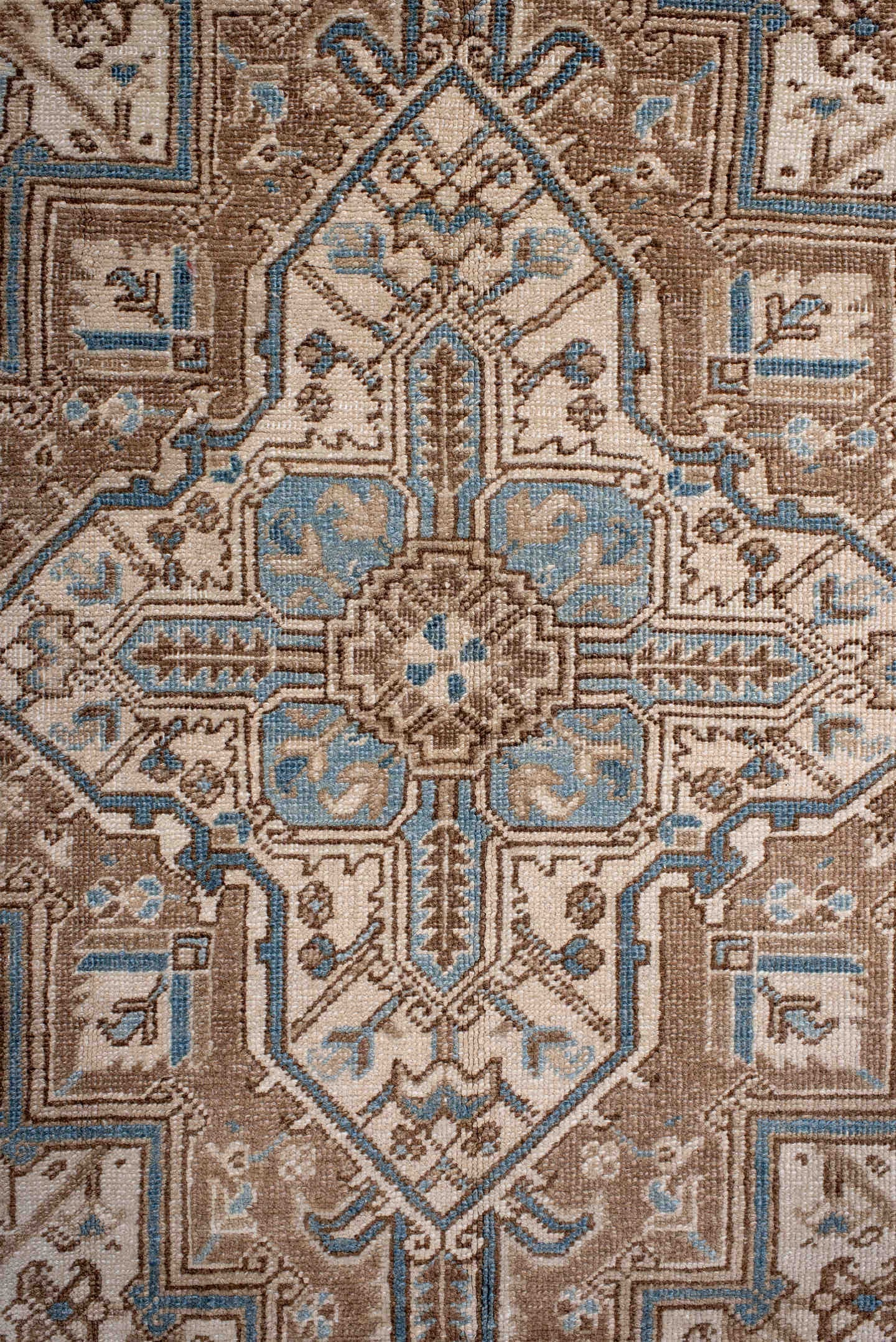 6' x 8' one-of-a-kind handmade antique Heriz medium size rug. Color palette: ivory, taupe, sky blue, camel, brown, beige