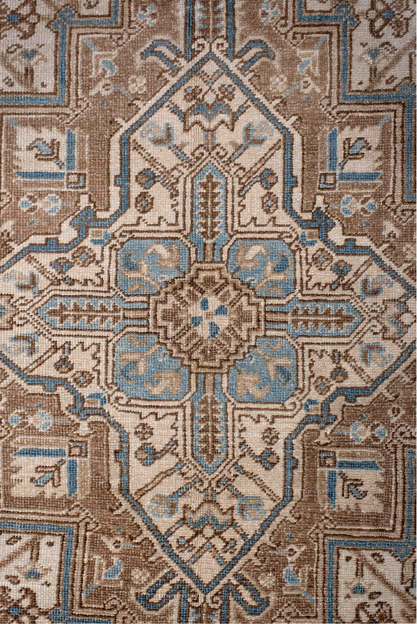 6' x 8' one-of-a-kind handmade antique Heriz medium size rug. Color palette: ivory, taupe, sky blue, camel, brown, beige