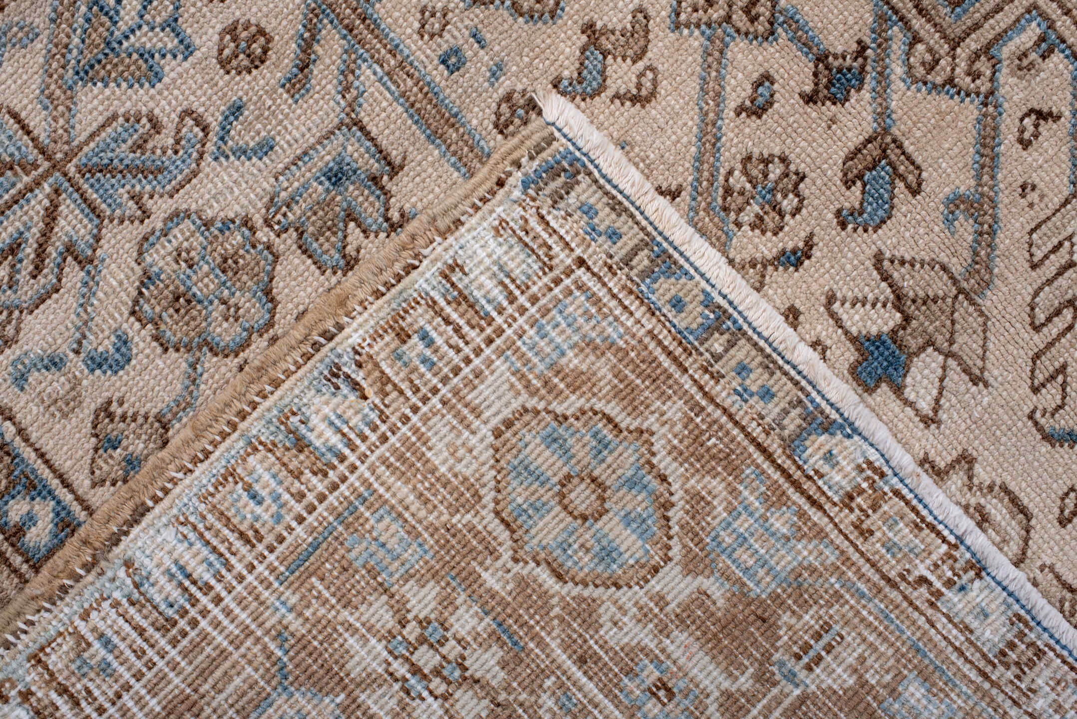 6' x 8' one-of-a-kind handmade antique Heriz medium size rug. Color palette: ivory, taupe, sky blue, camel, brown, beige