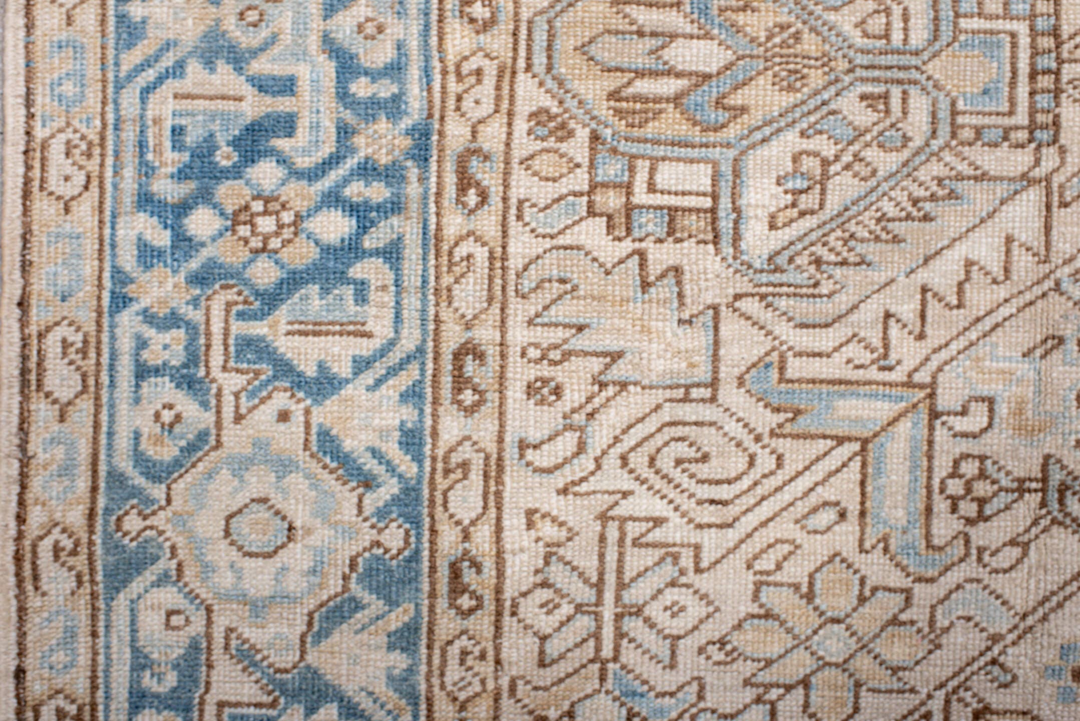6' x 8' one-of-a-kind handmade antique Heriz medium size rug. Color palette: ivory, sky blue, camel, taupe, light brown