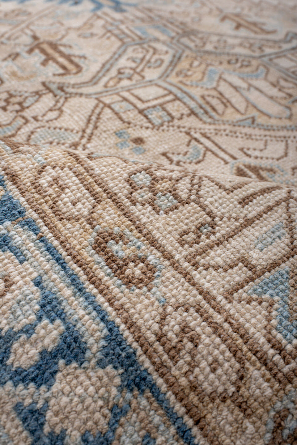 6' x 8' one-of-a-kind handmade antique Heriz medium size rug. Color palette: ivory, sky blue, camel, taupe, light brown