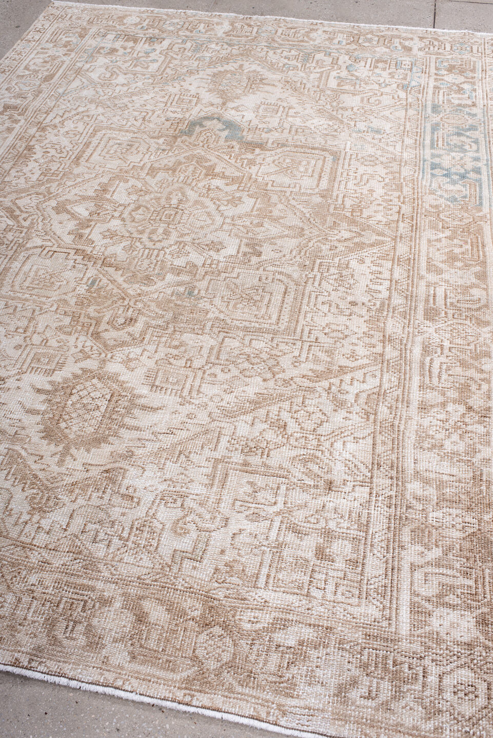 6' x 8' one-of-a-kind handmade antique Heriz medium size rug. Color palette: ivory, camel, taupe, beige, pale blue, sand