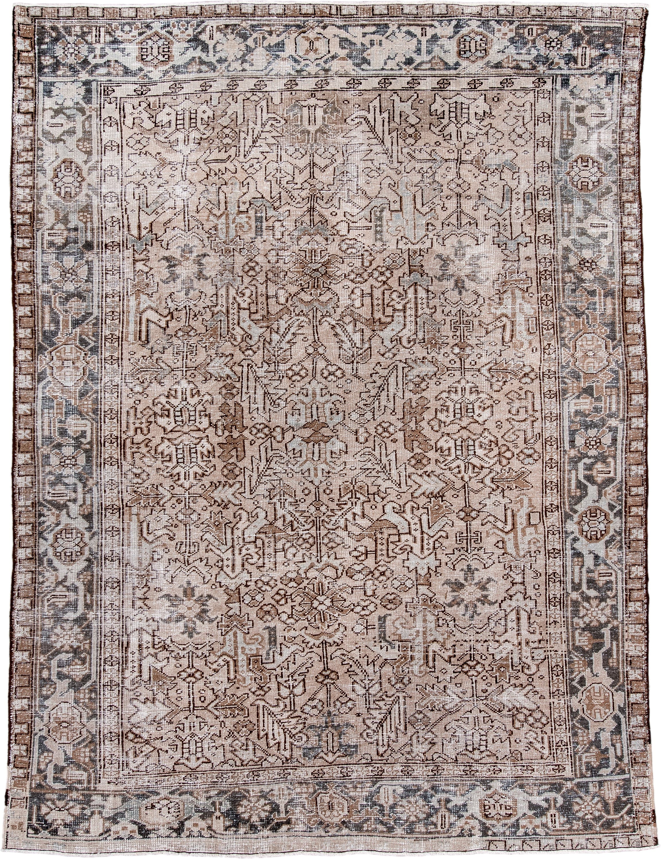7' x 10' one-of-a-kind handmade antique Heriz large size rug. Color palette: ivory, taupe, charcoal, brown, beige, slate