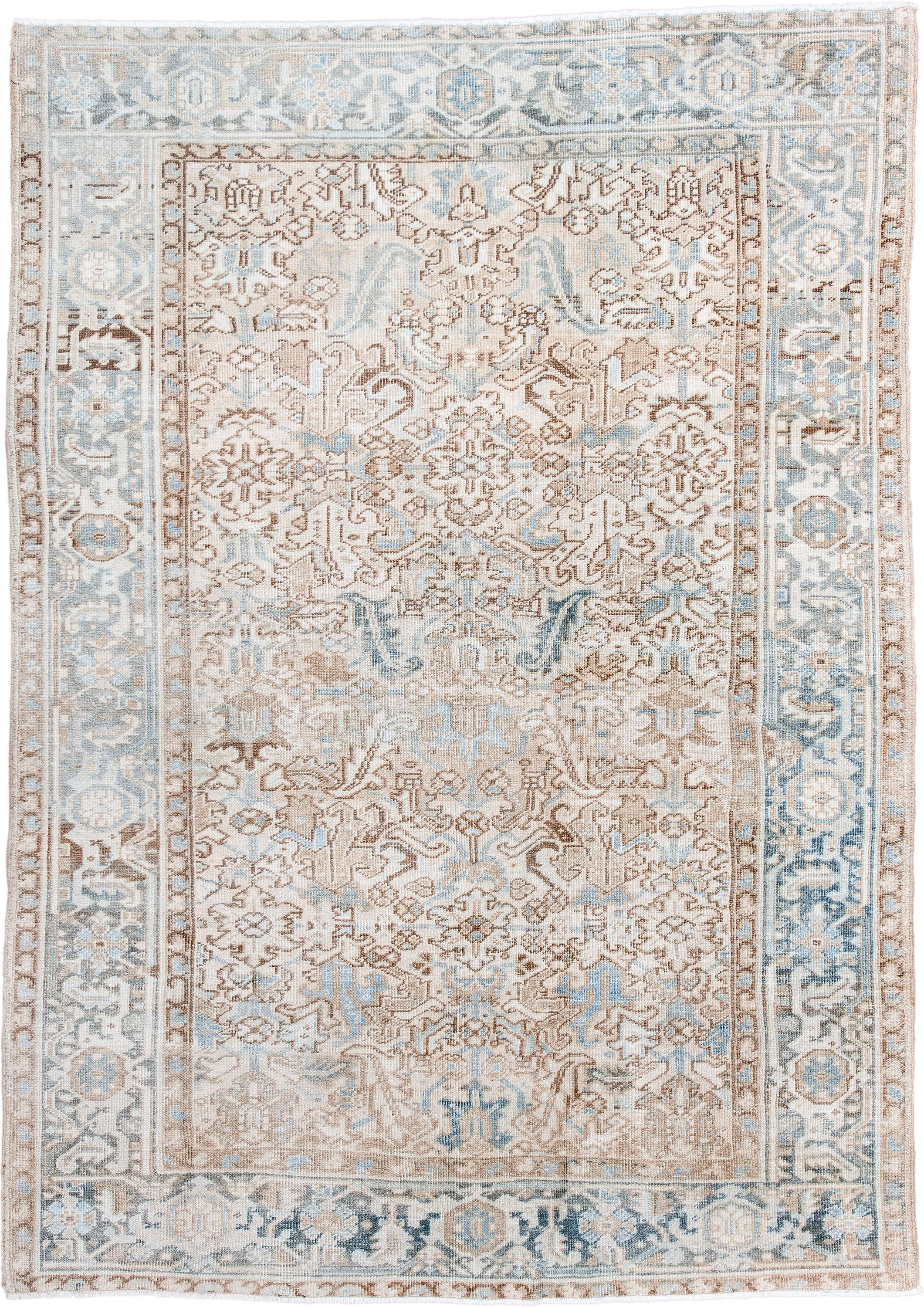 6' x 9' one-of-a-kind handmade antique Heriz medium size rug. Color palette: ivory, light blue, taupe, beige, camel