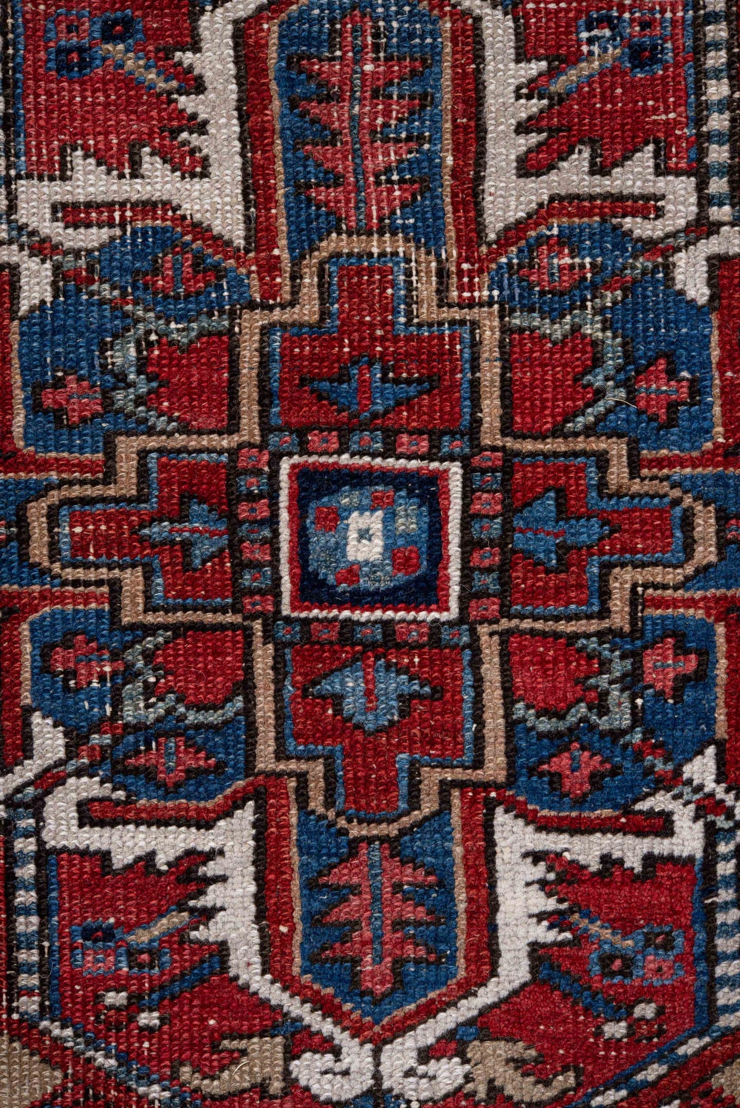 7' x 11' one-of-a-kind handmade vintage Heriz large size rug. Color palette: rust, navy, ivory, sky blue, camel, crimson
