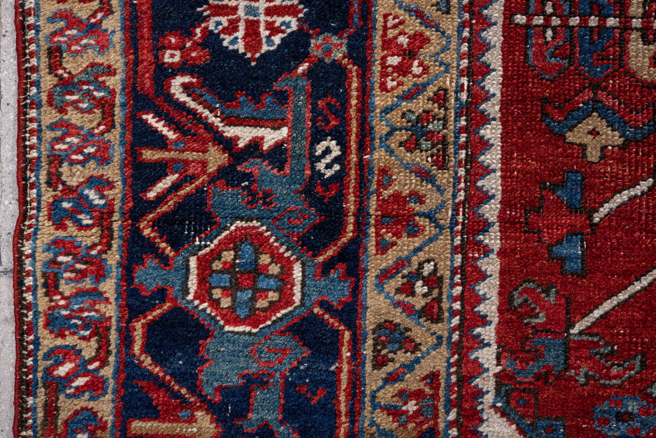 7' x 11' one-of-a-kind handmade vintage Heriz large size rug. Color palette: rust, navy, ivory, sky blue, camel, crimson