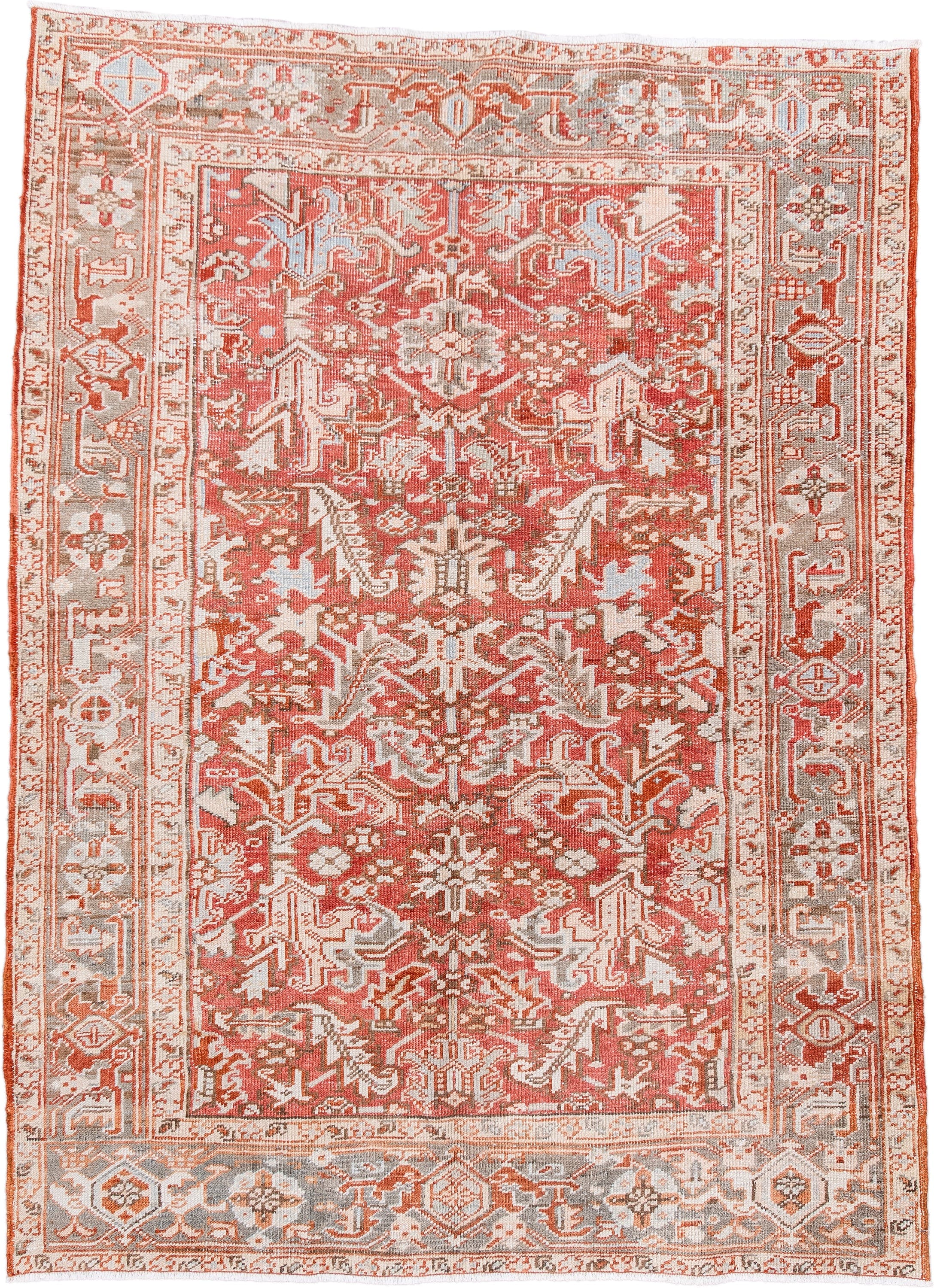 5' x 7' one-of-a-kind handmade vintage Heriz rug. Color palette: coral, ivory, taupe, terra cotta, camel, sage, terracotta